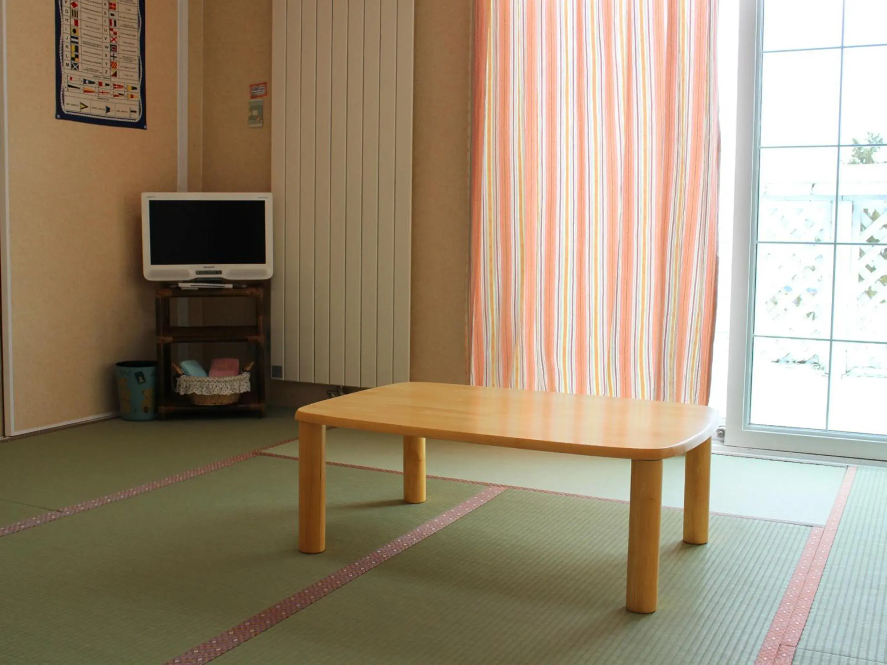 Photo of the whole room, TV/Entertainment Center in Pension Hoshi Ni Negaiwo