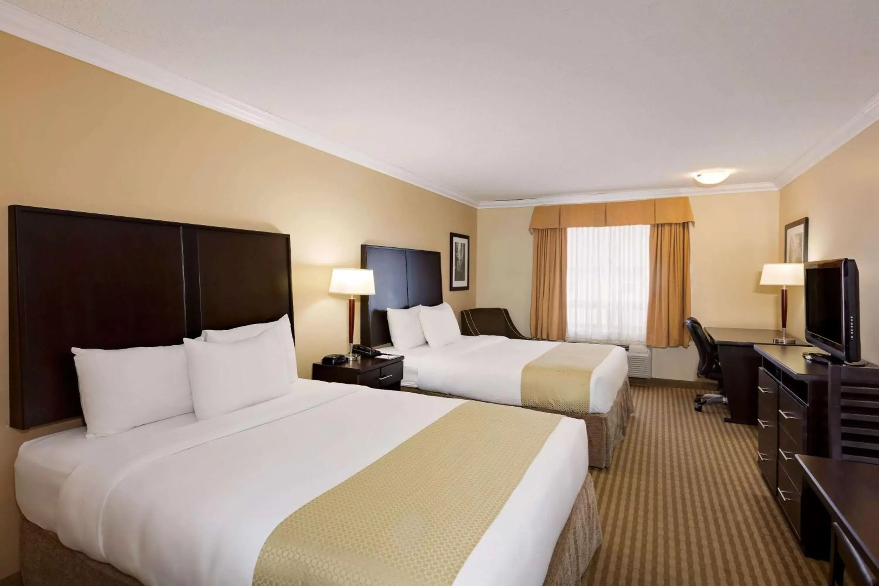 Photo of the whole room, Bed in Ramada by Wyndham Cold Lake