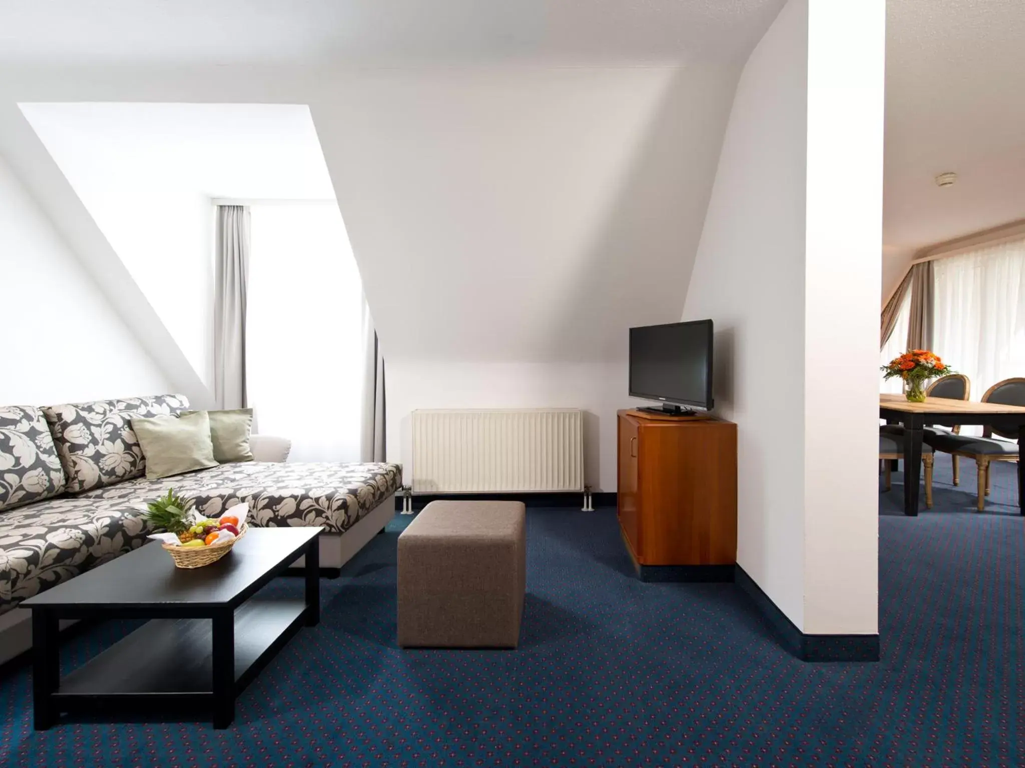 Living room in ACHAT Hotel Neustadt an der Weinstraße Living room in ACHAT Hotel Neustadt an der Weinstraße