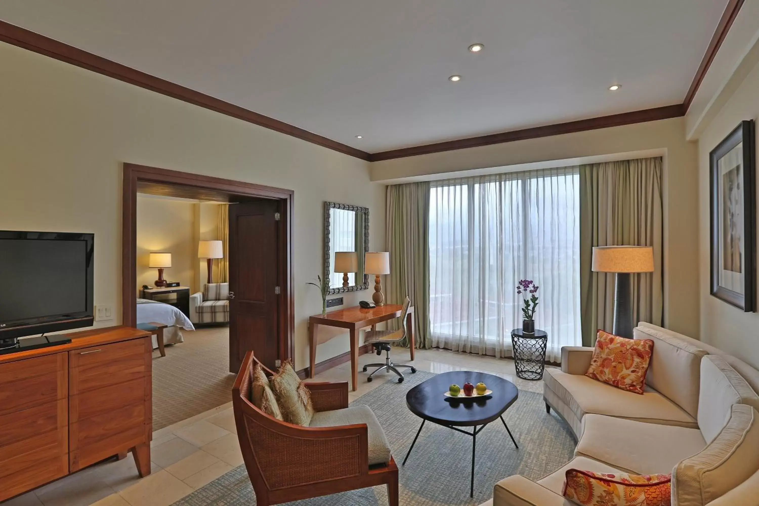 Bedroom, Seating Area in Real InterContinental at Multiplaza Mall, an IHG Hotel