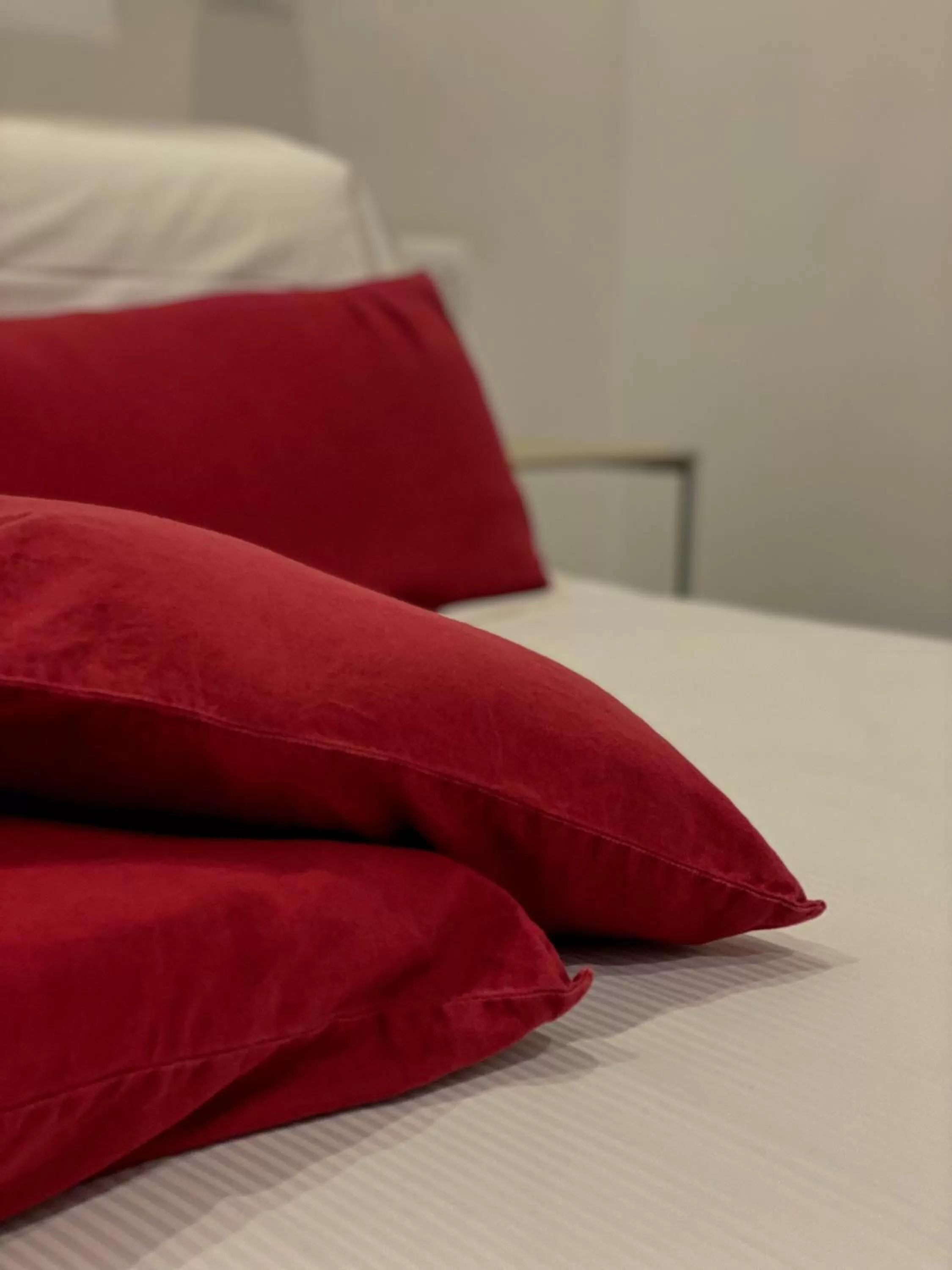 Bed in Megaris Luxury Suite Rooms