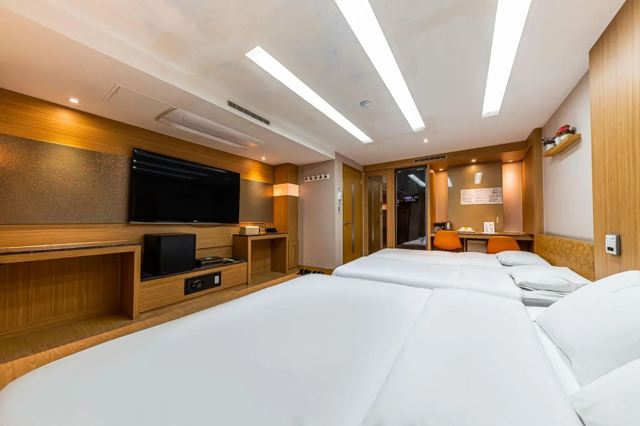 TV/Entertainment Center in Friendly DH Naissance Hotel by Mindrum group