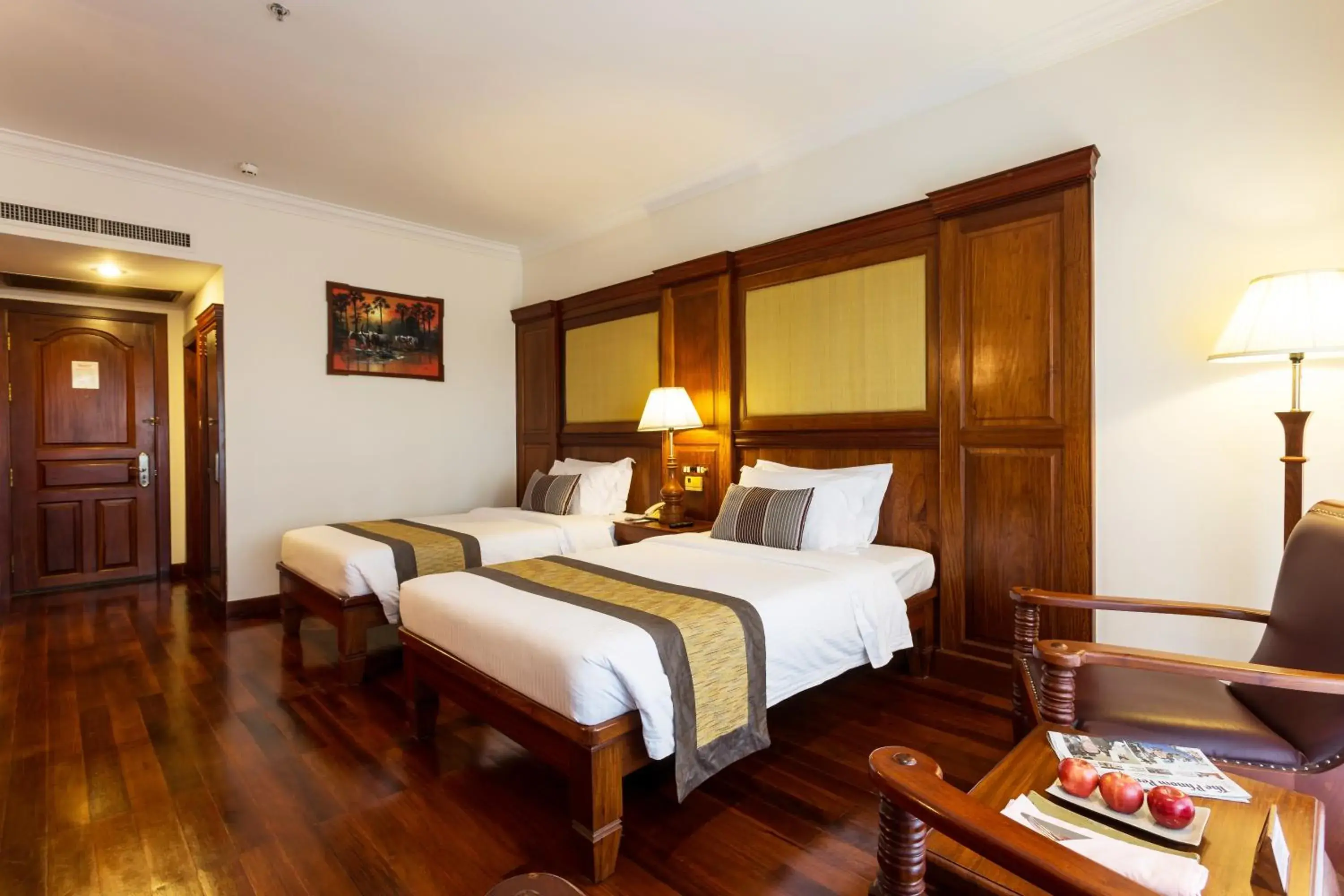 Bed in Empress Residence Resort and Spa