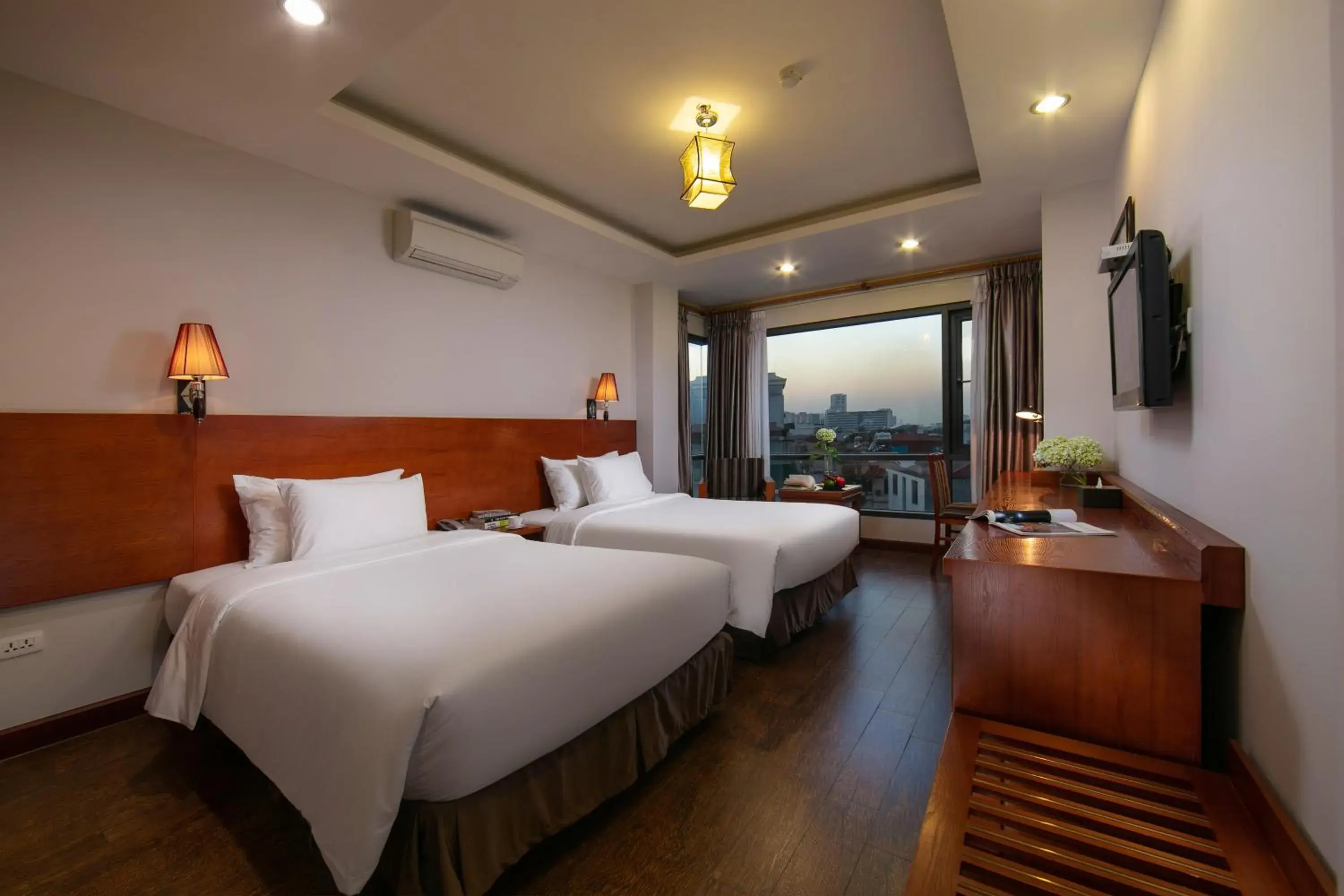 Bed in Sen Luxury Hotel