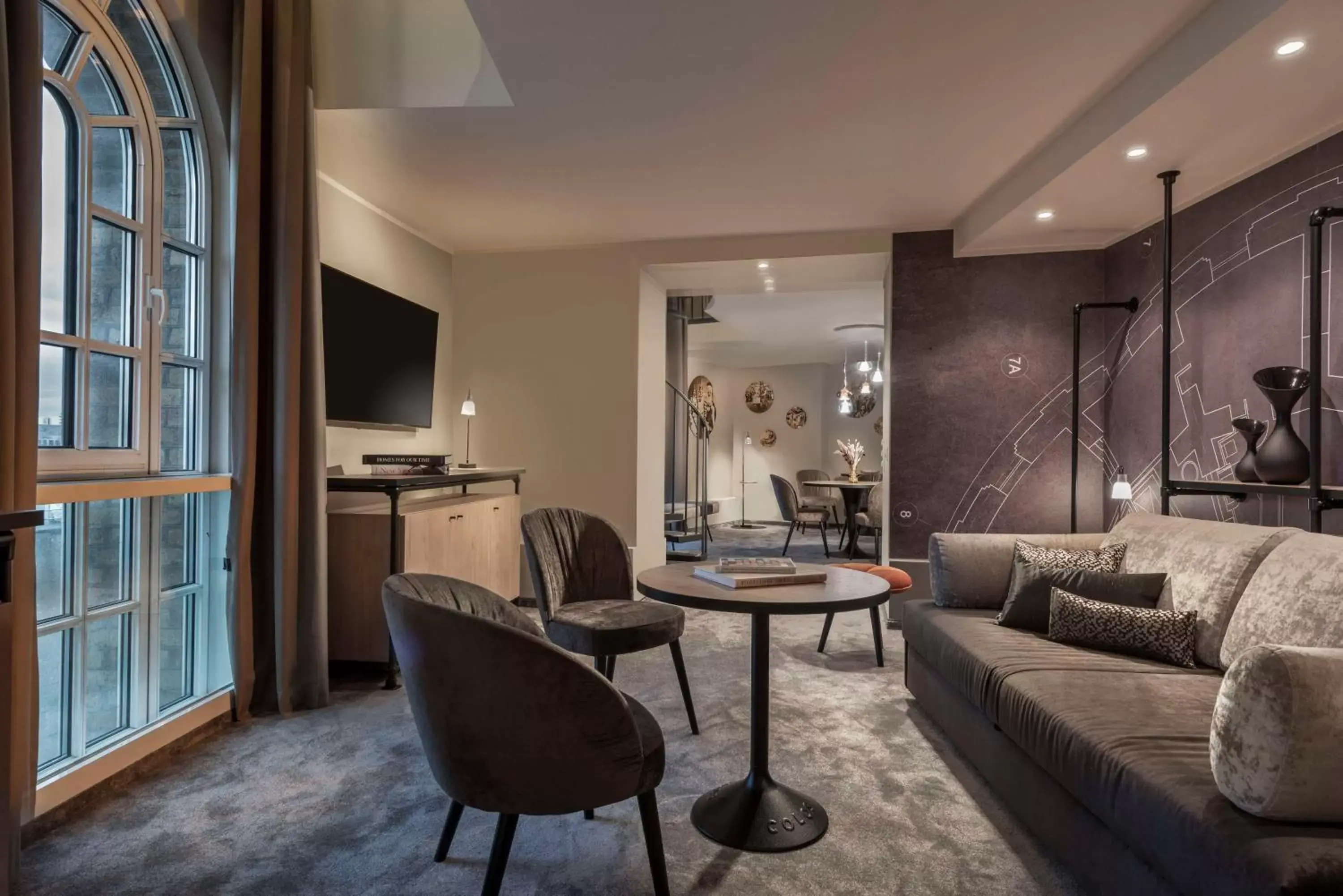 Bedroom, Seating Area in Wasserturm Hotel Cologne, Curio Collection by Hilton