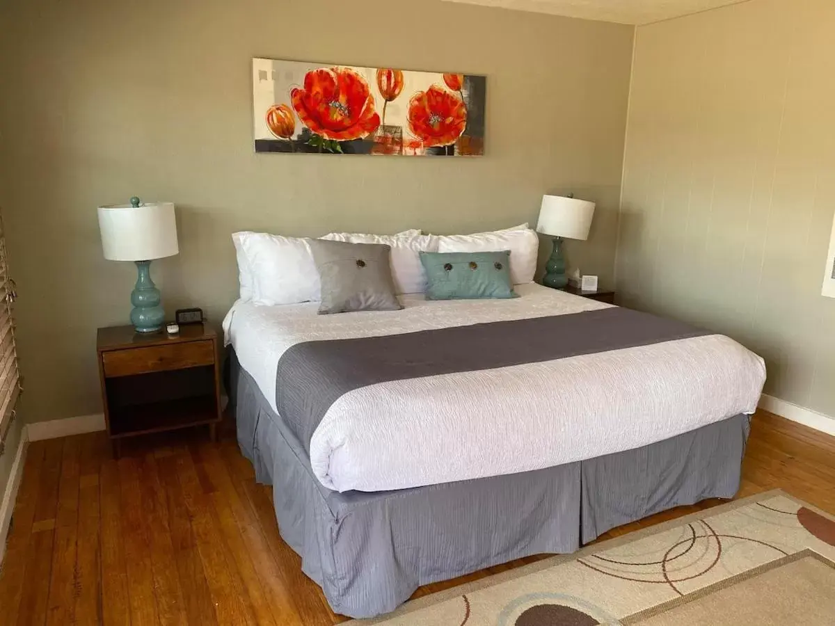 Bed in The Flagstone Boutique Inn & Suites