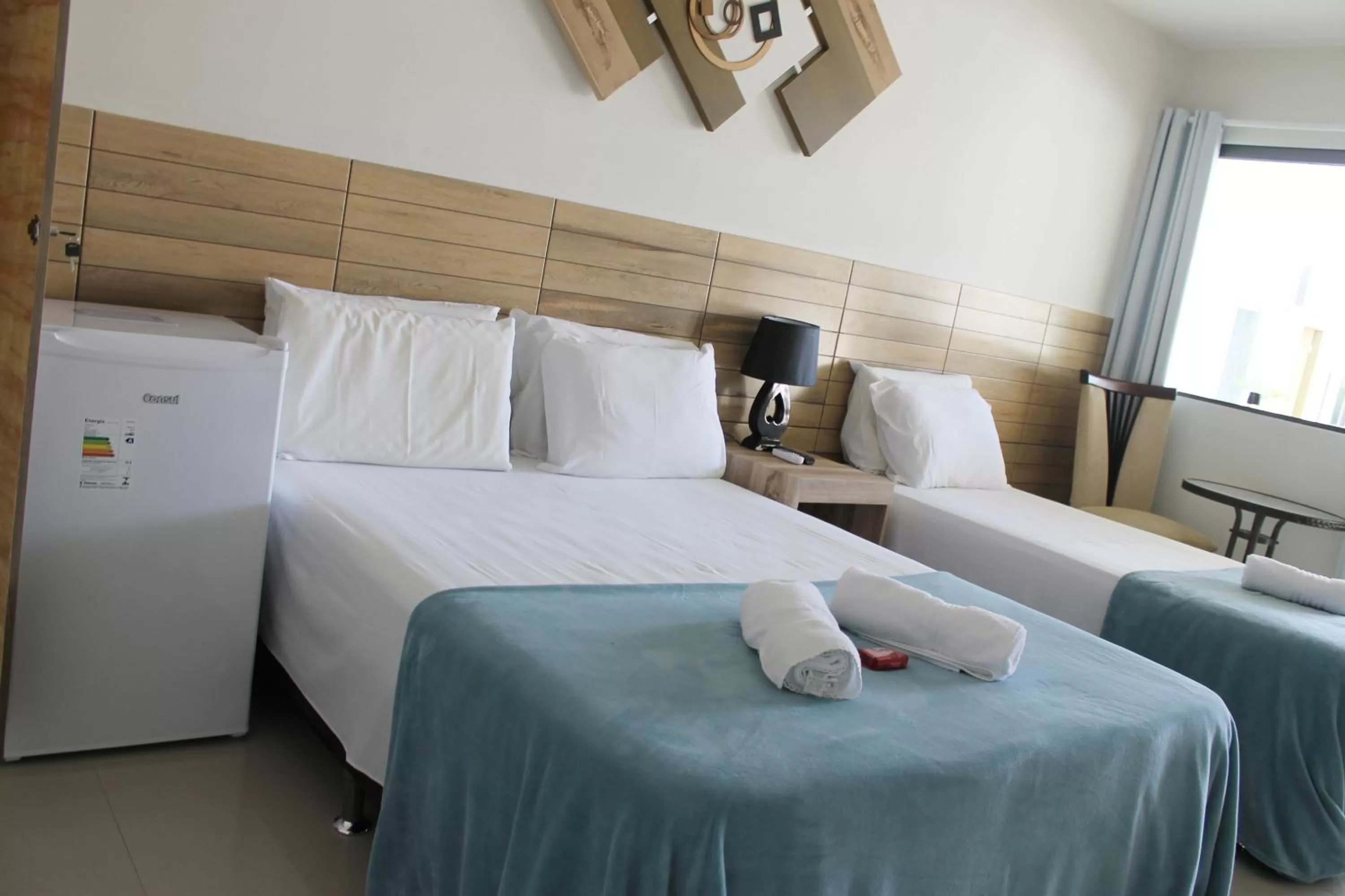 Bed in Pousada Das Palmeiras