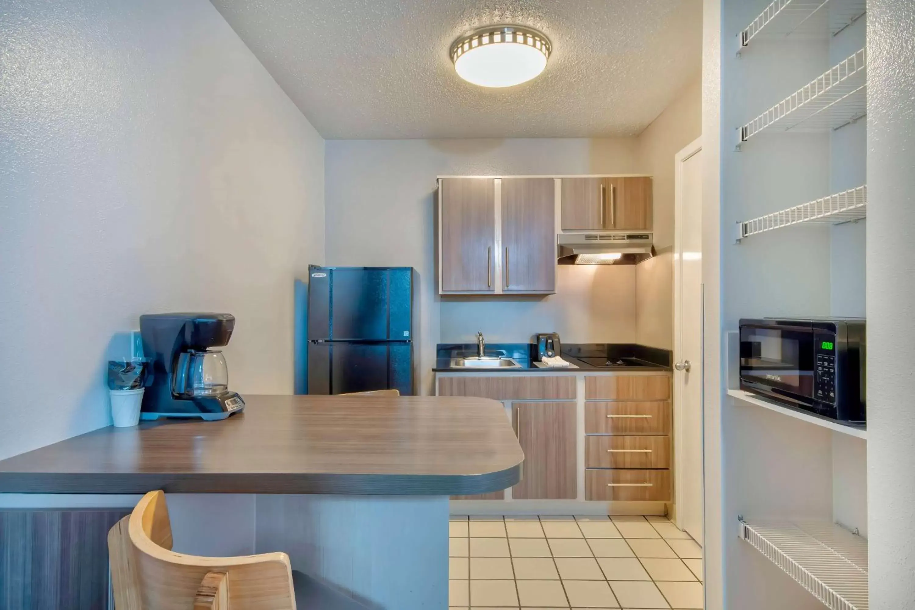 Photo of the whole room, Kitchen/Kitchenette in Studio 6-San Antonio, TX - Medical Center