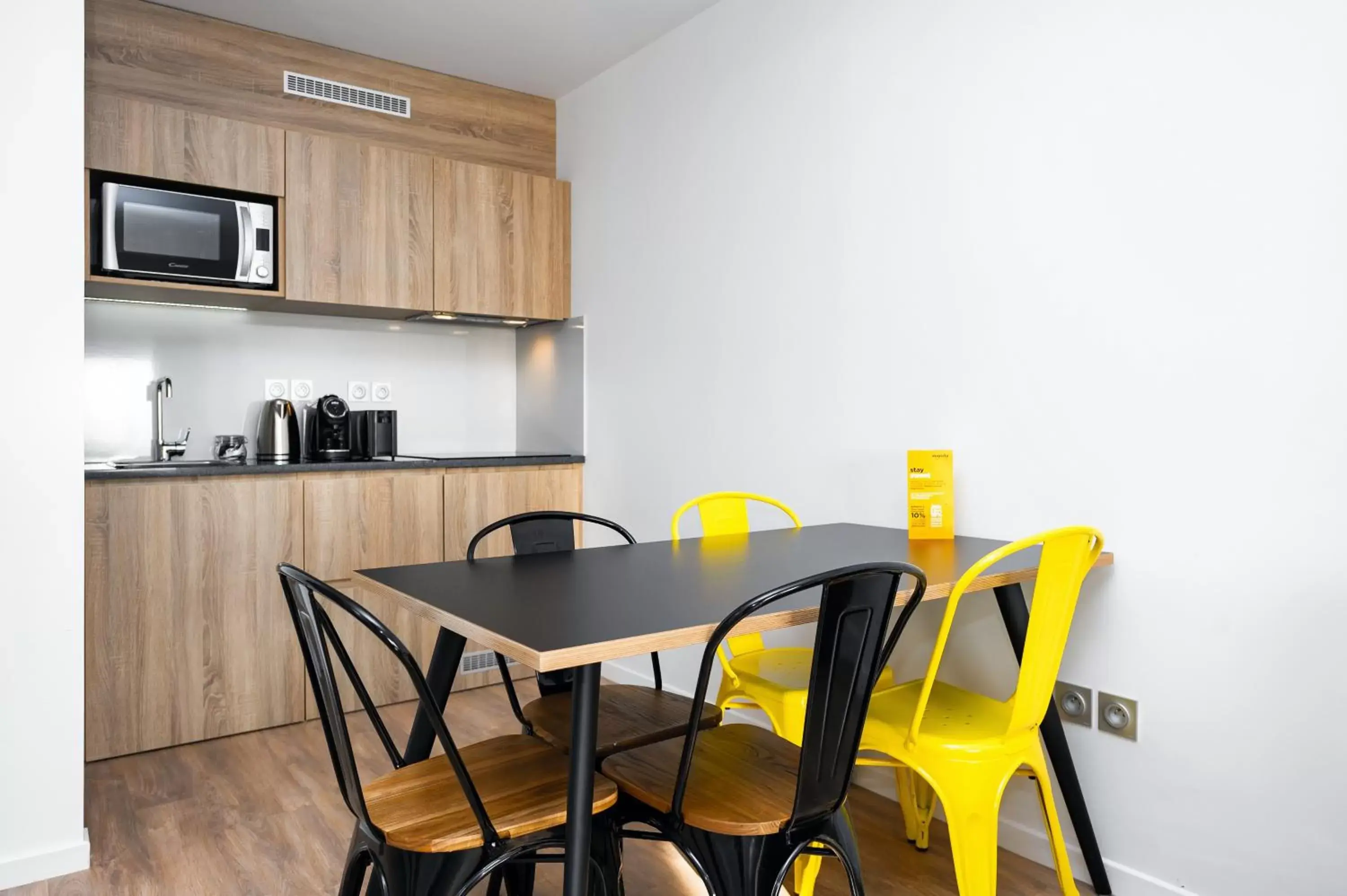 Kitchen or kitchenette, Dining Area in Staycity Aparthotels near Disneyland Paris
