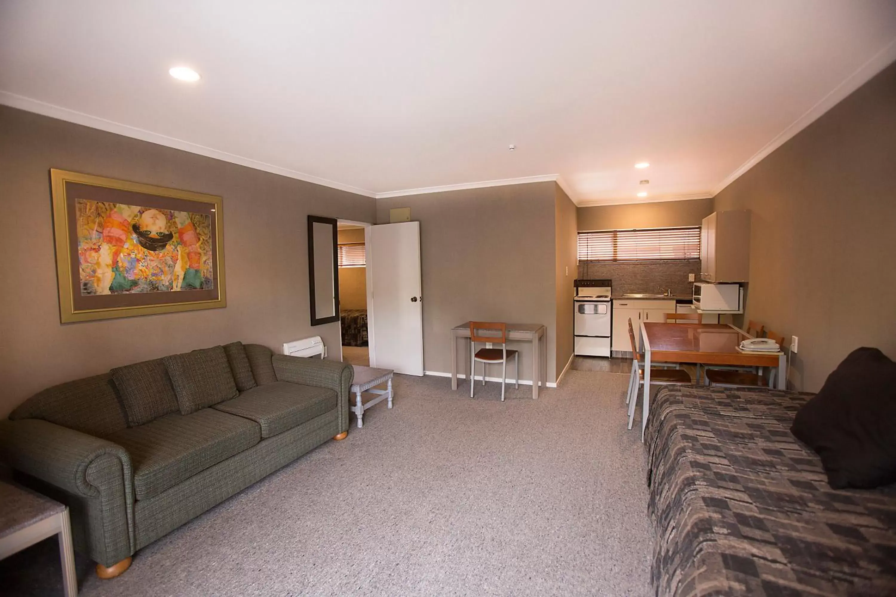 Living room, Seating Area in Distinction Coachman Hotel, Palmerston North