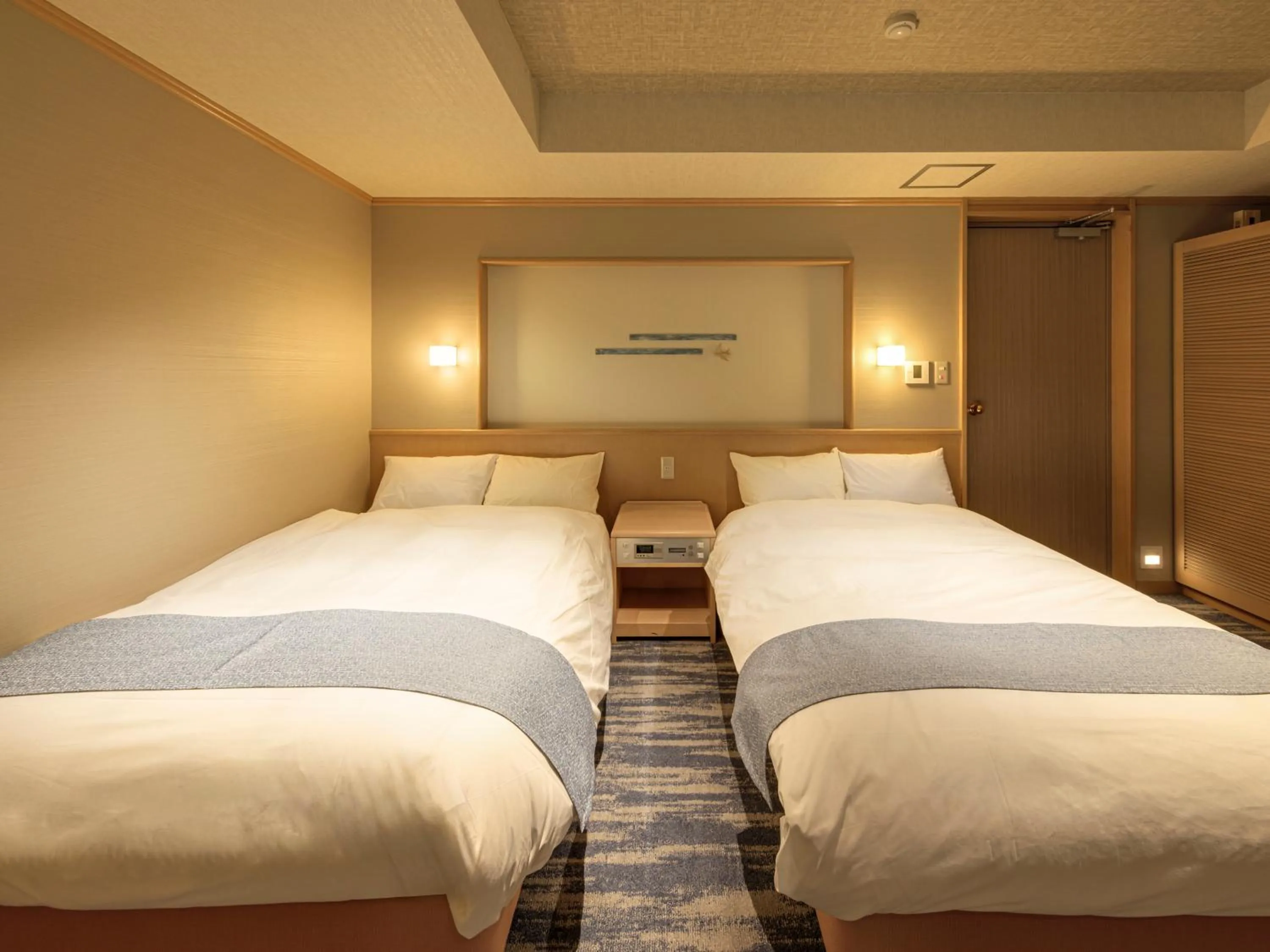 Bed in Ito Hotel Juraku