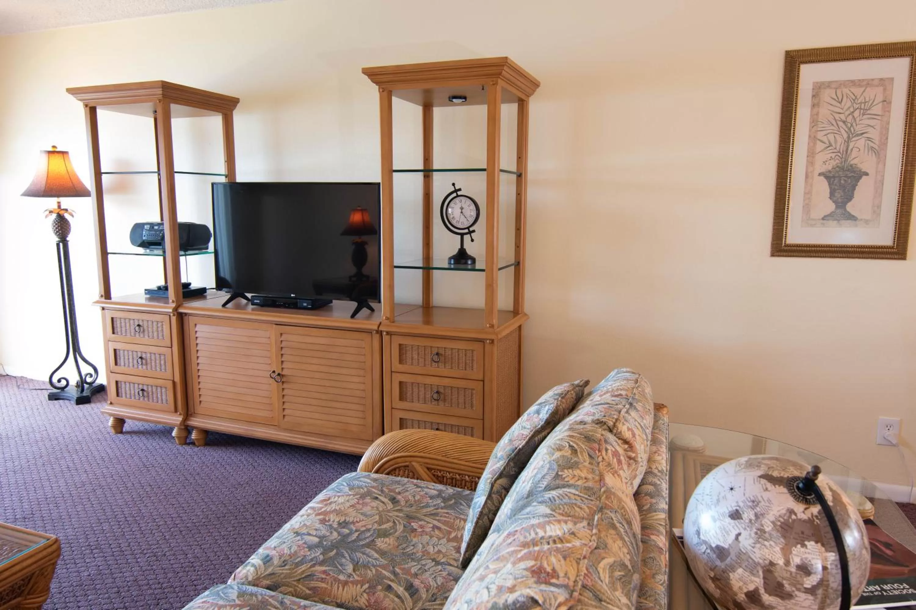 TV/Entertainment Center in Palm Beach Waterfront Condos - Full Kitchens!