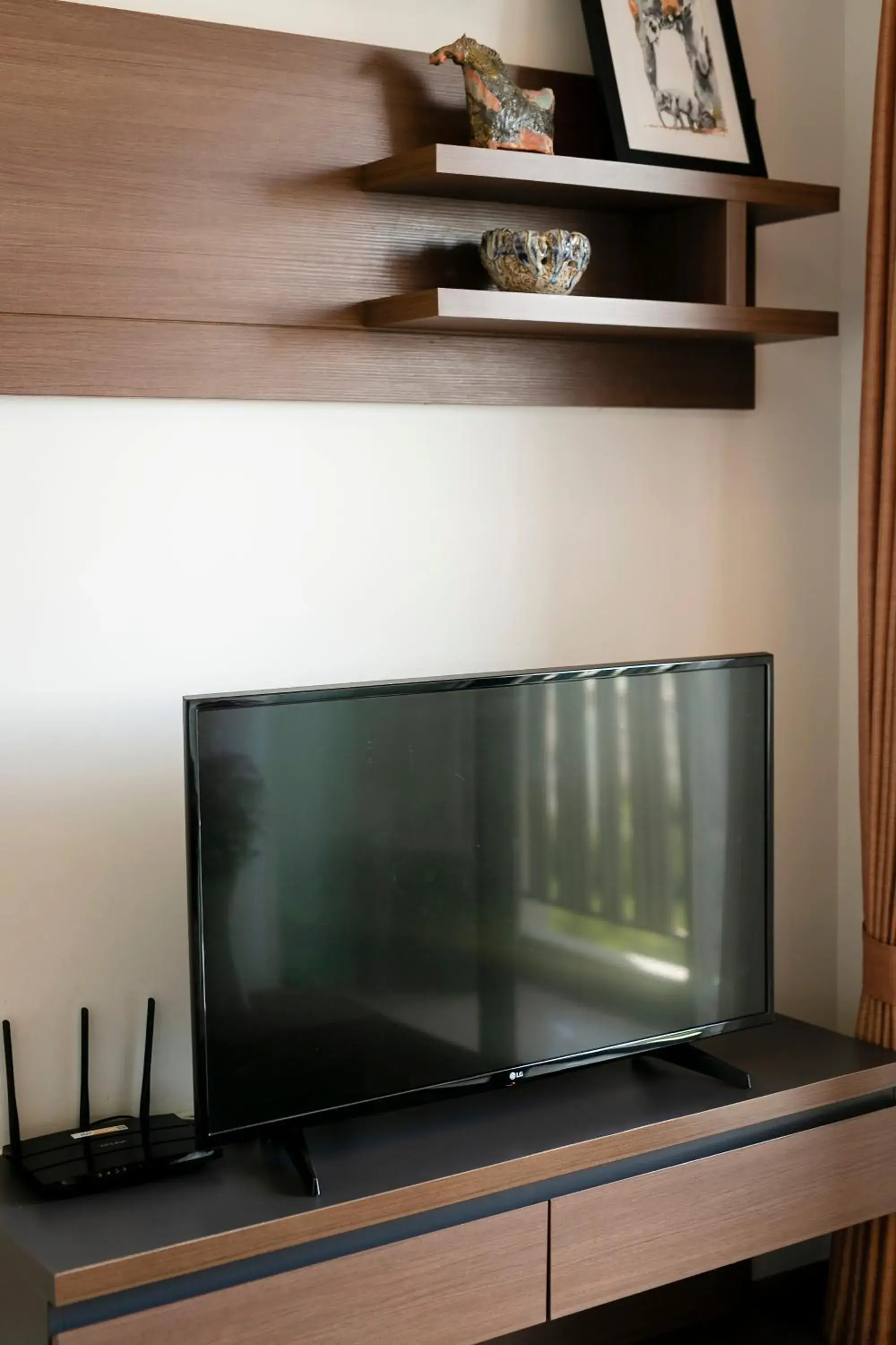 TV/Entertainment Center in Anta Residence ''Self-sevice apartment''
