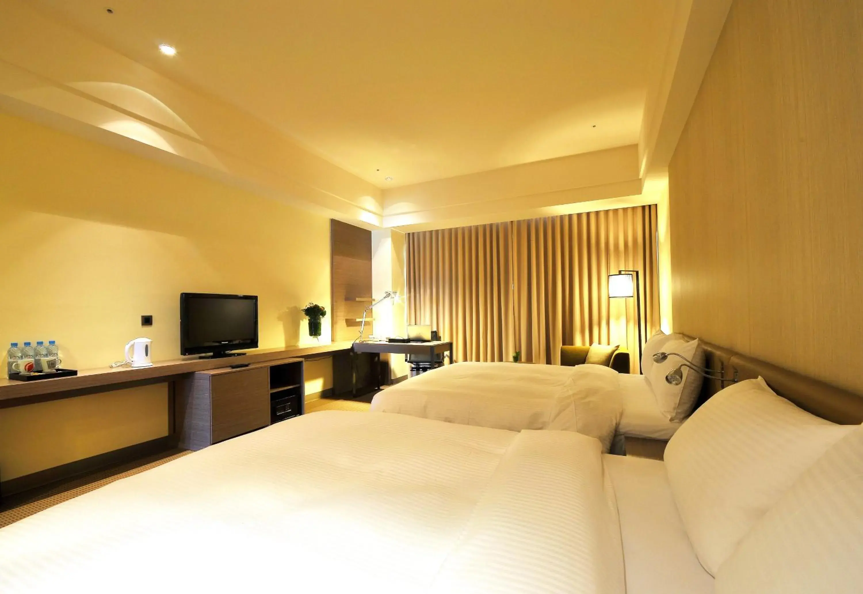 Bed in Zenda Suites