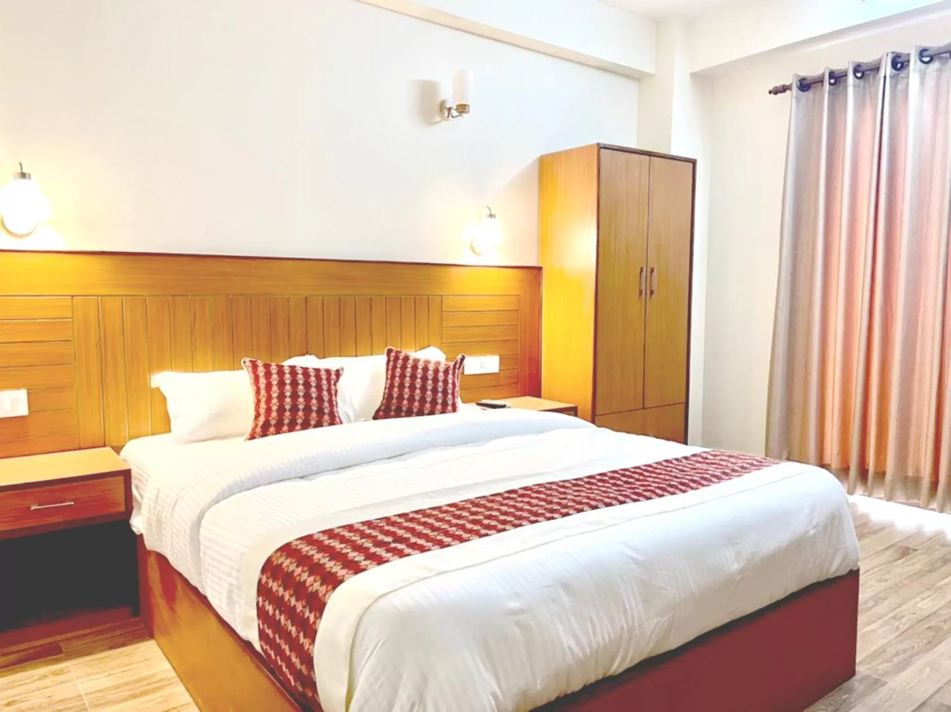 Bed in Madhuban Hotel