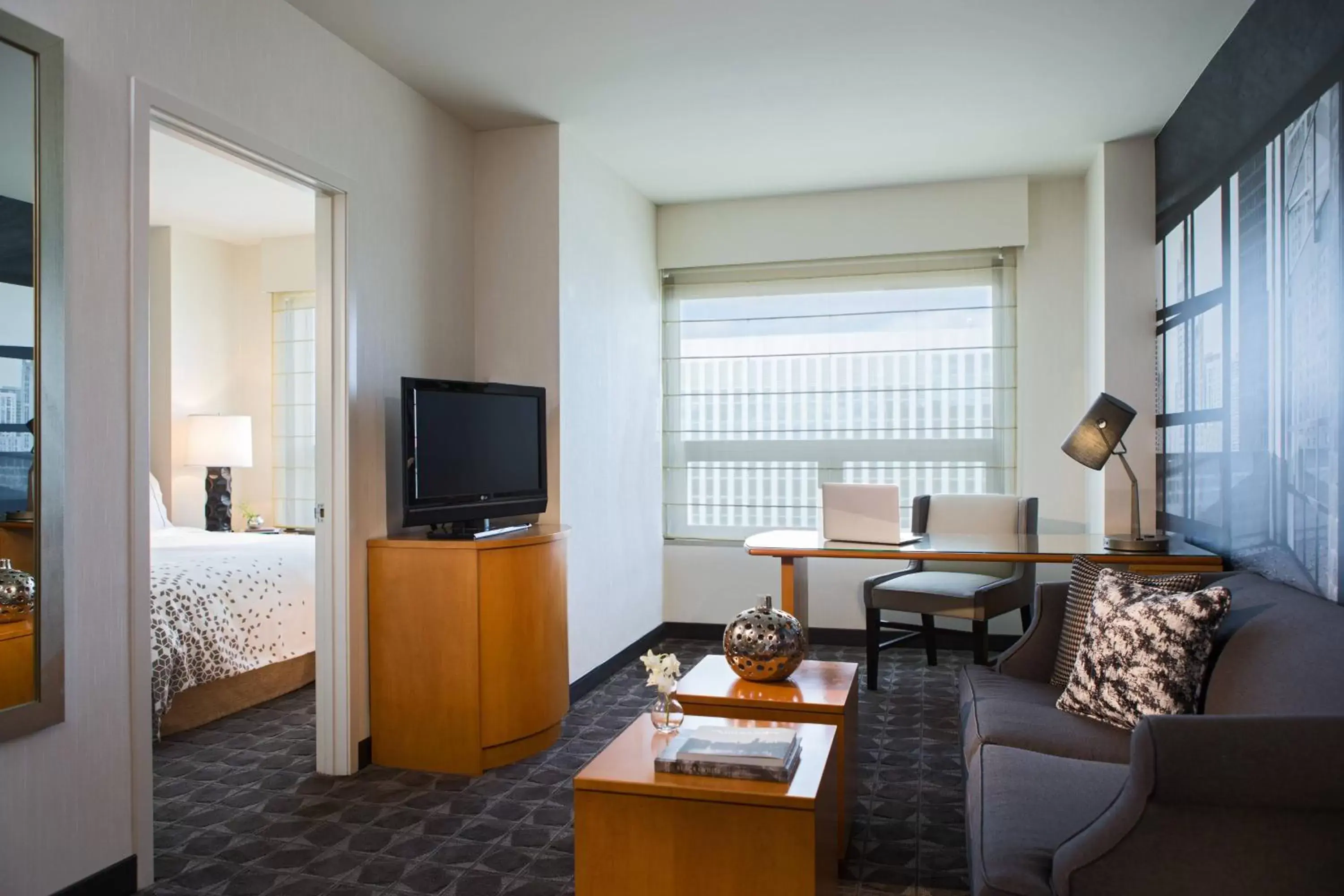 Living room, TV/Entertainment Center in Renaissance Chicago O'Hare Suites Hotel
