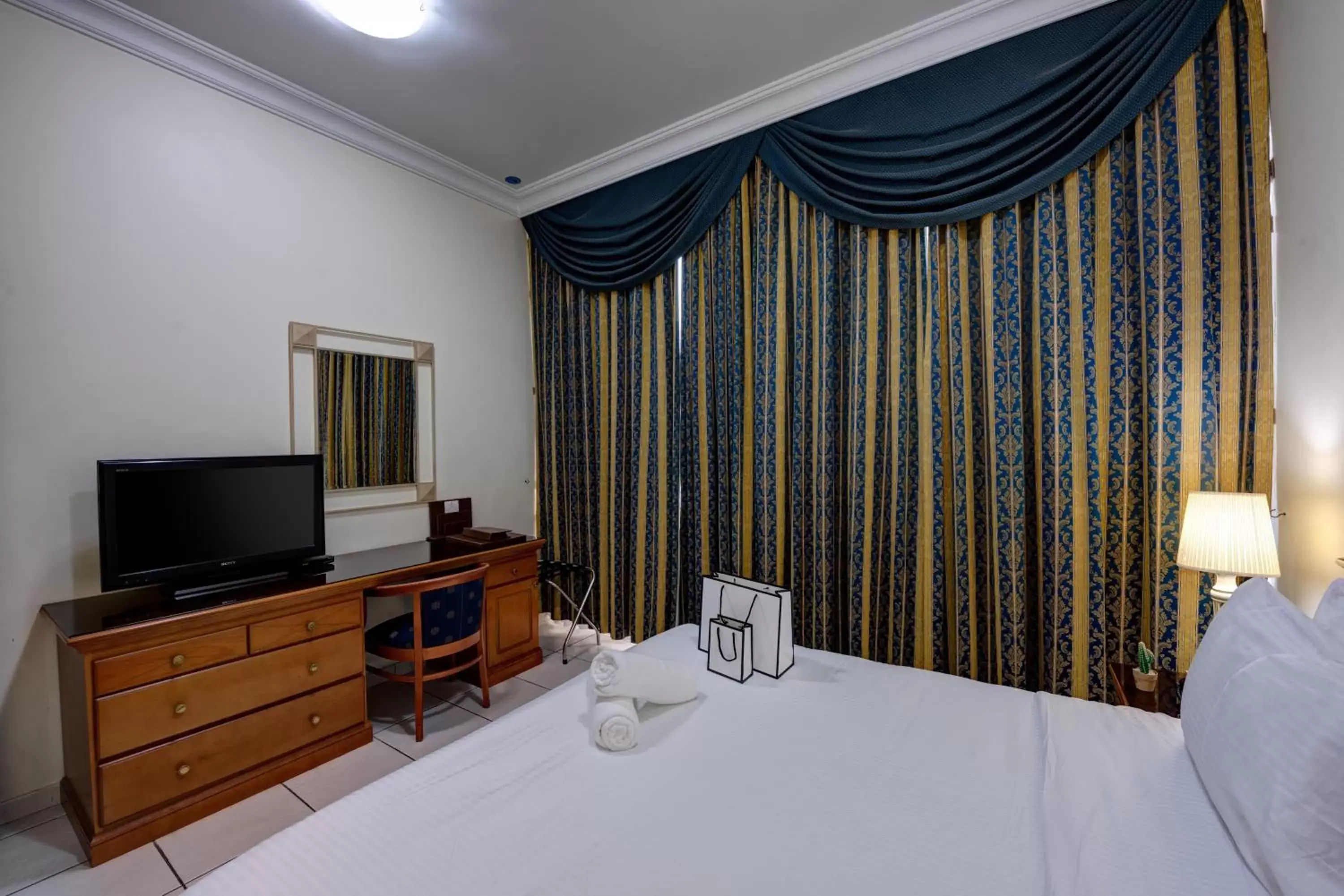 hair dresser, Bed in Al Nakheel Hotel Apartments Abu Dhabi