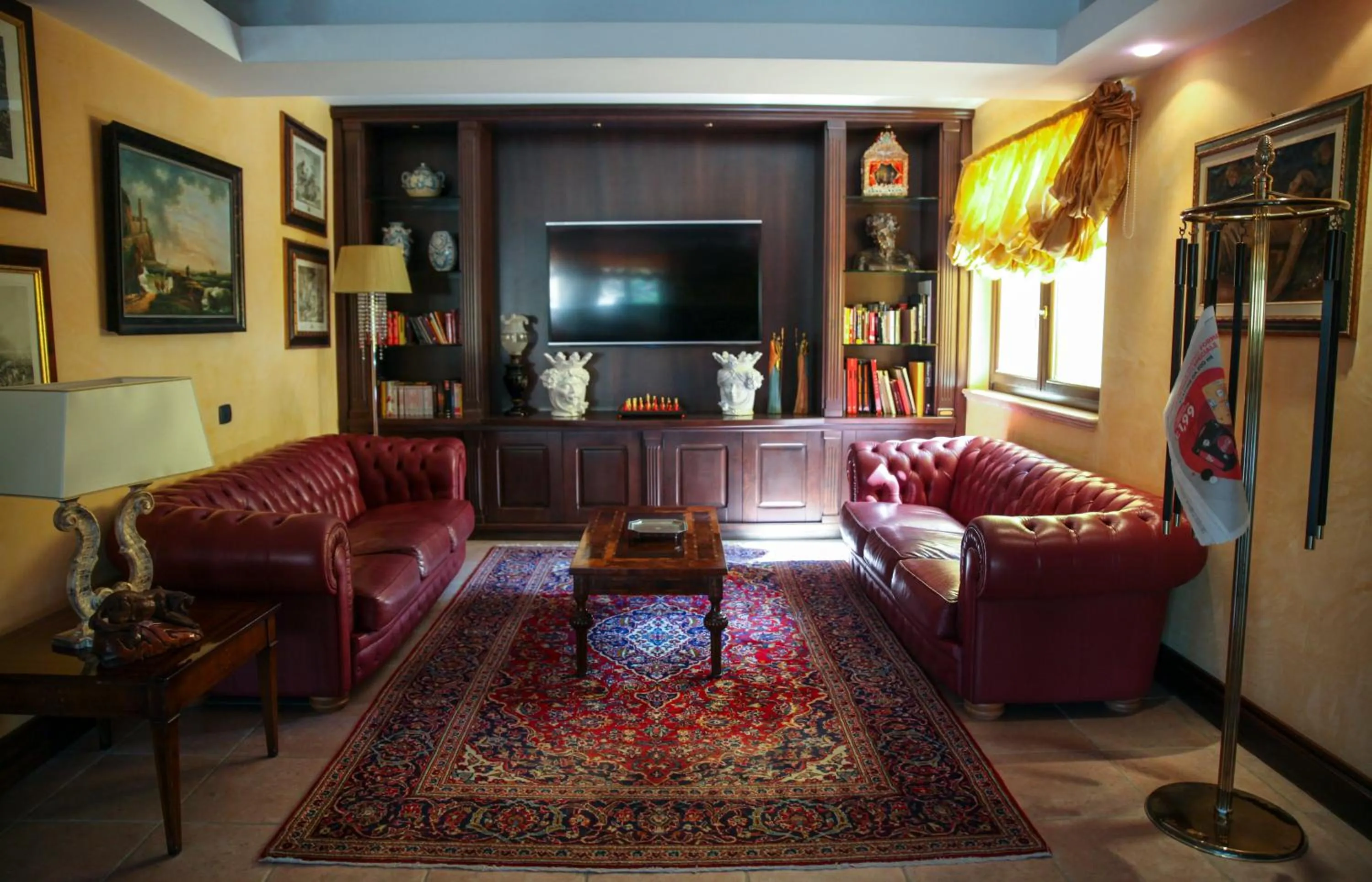 Communal lounge/ TV room in Baia Di Ulisse Wellness & Spa