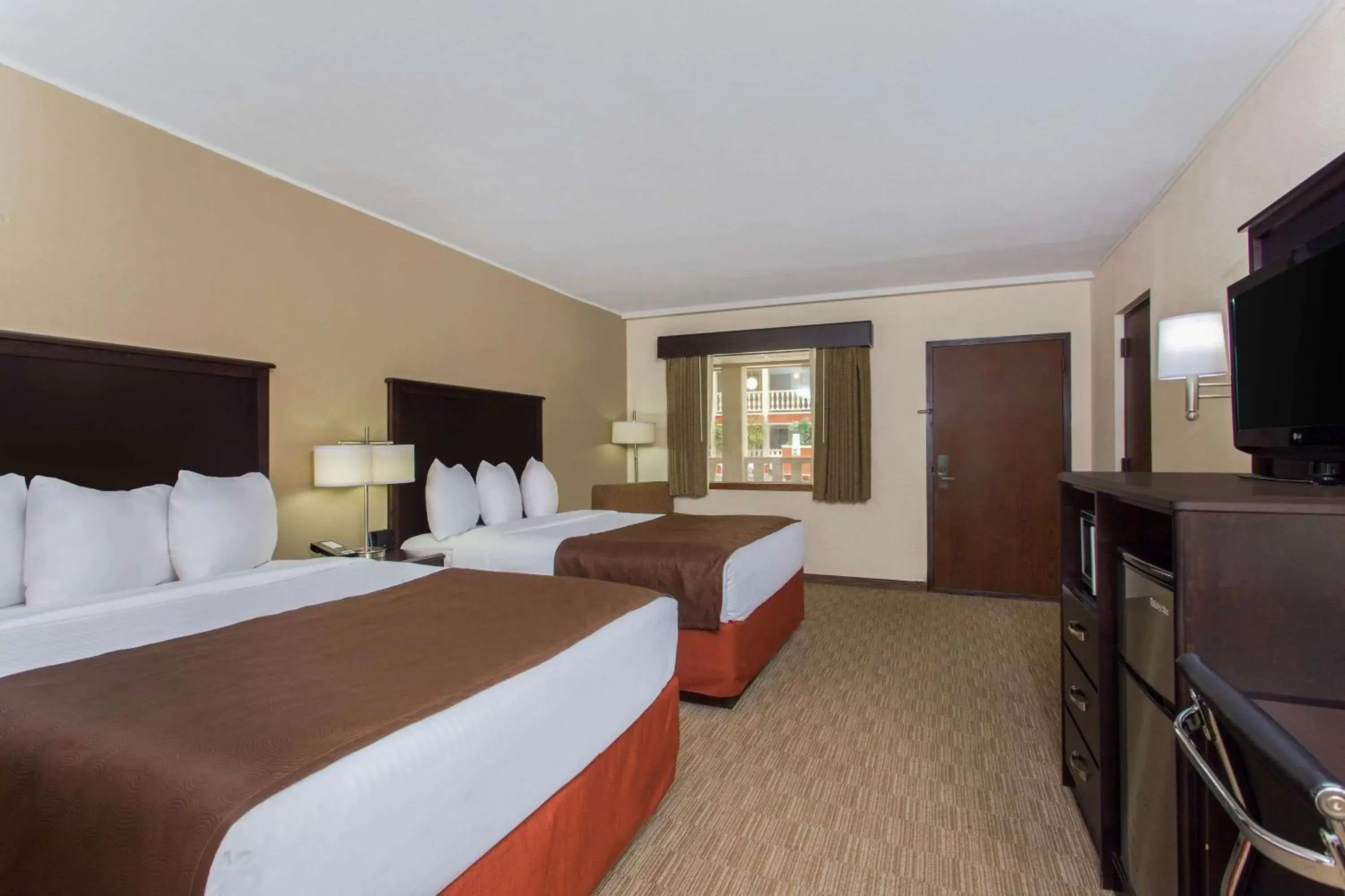 Photo of the whole room, Bed in AmericInn by Wyndham Janesville