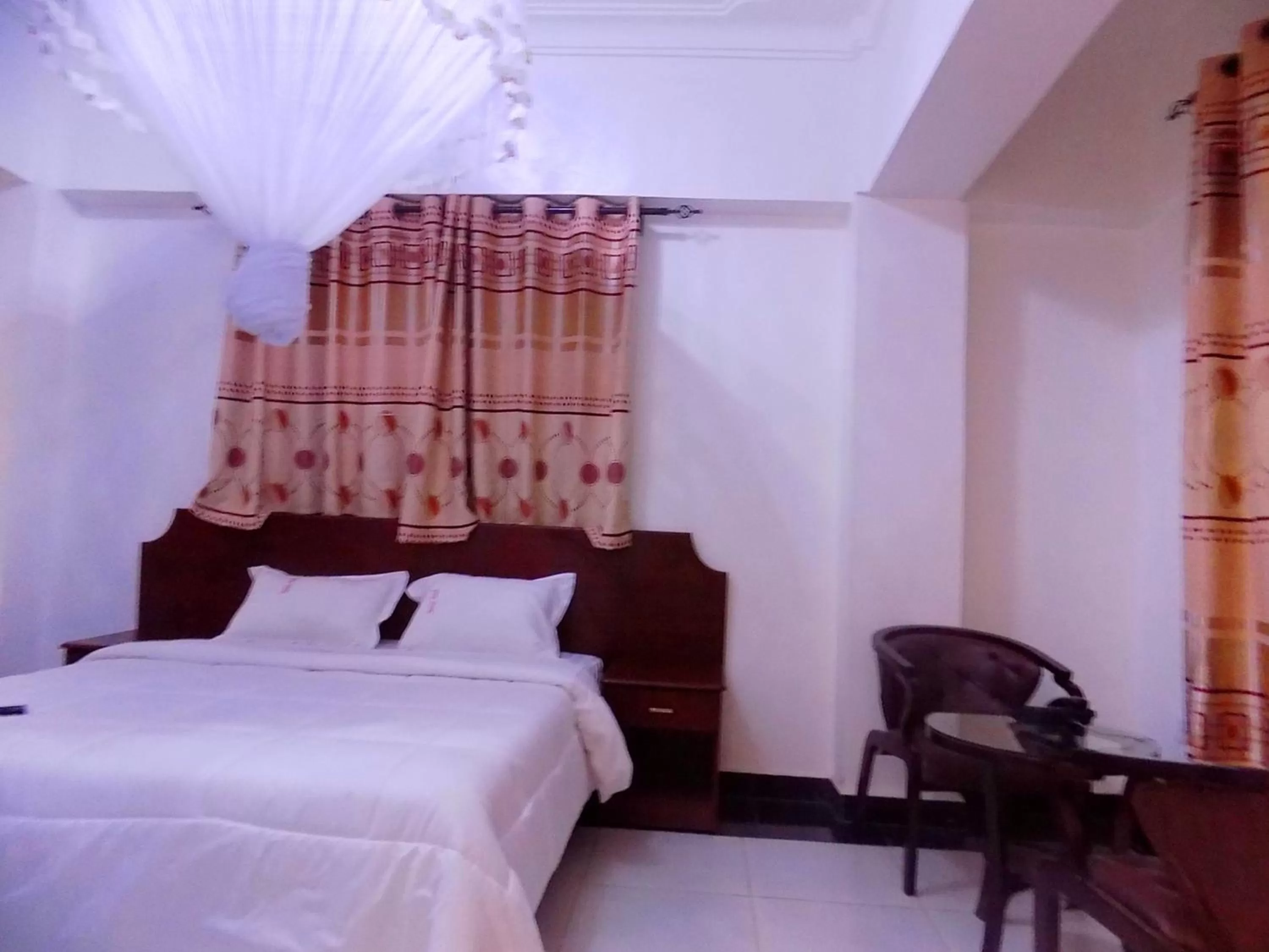 Bed in Sunrise Hotel Kampala