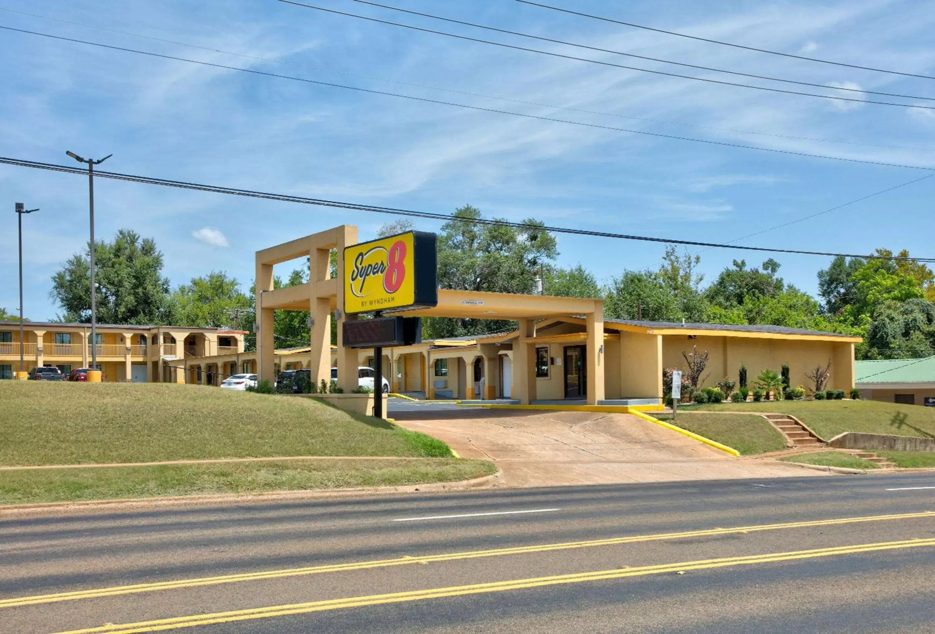 Property building in Super 8 by Wyndham Palestine TX Property building in Super 8 by Wyndham Palestine TX