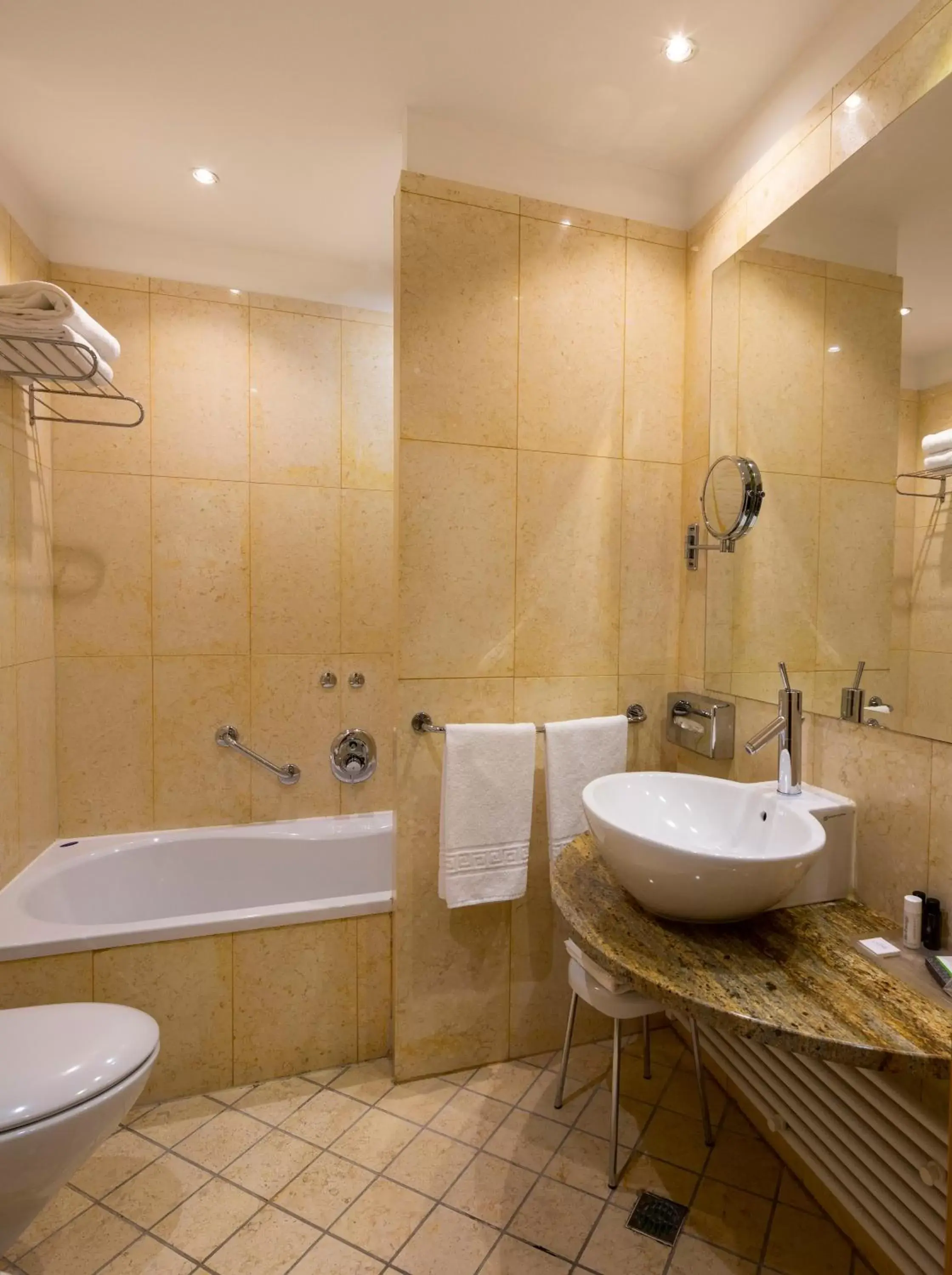 Toilet, Bathroom in Crowne Plaza Padova, an IHG Hotel