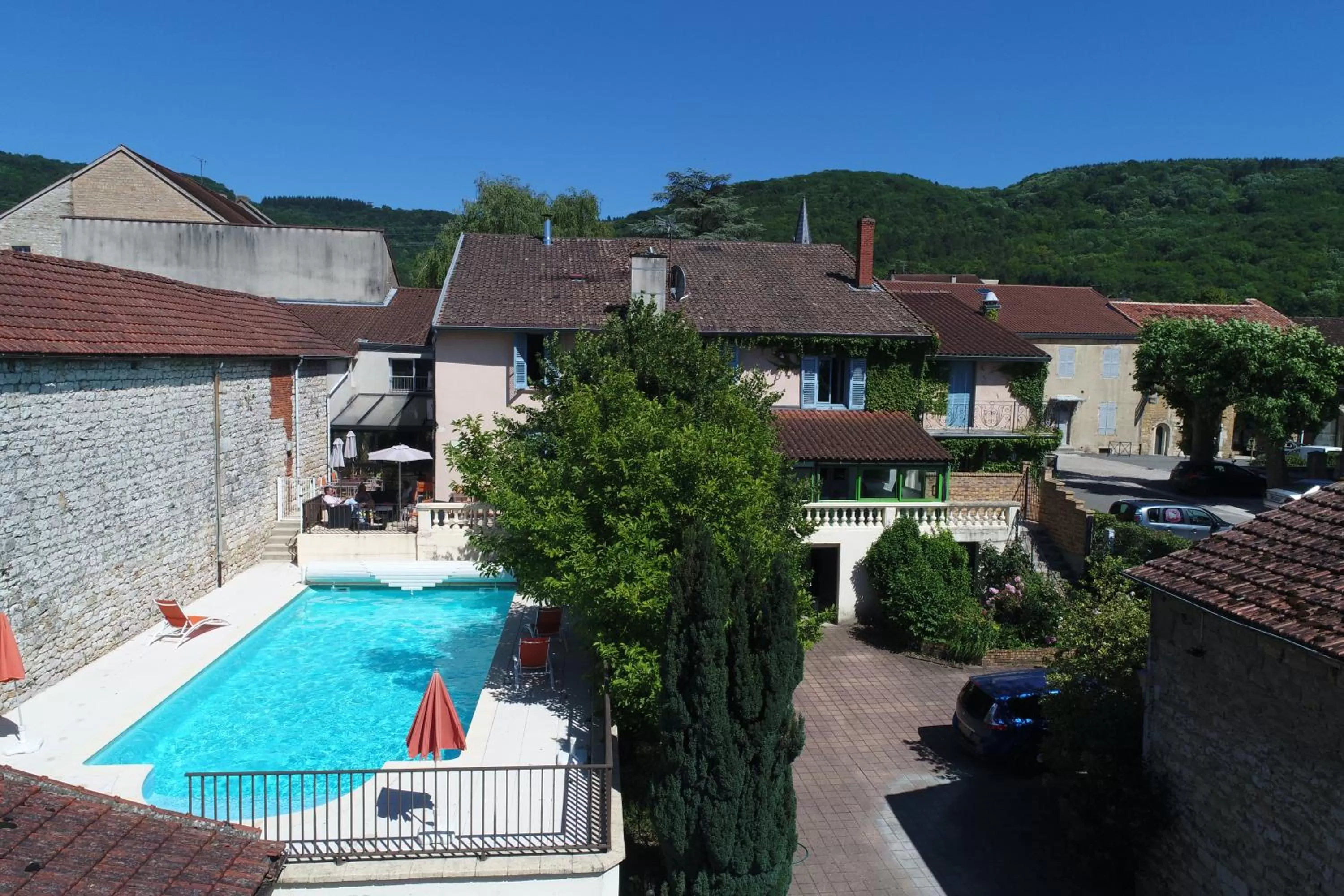 Pool view in Logis Hôtel Vuillot