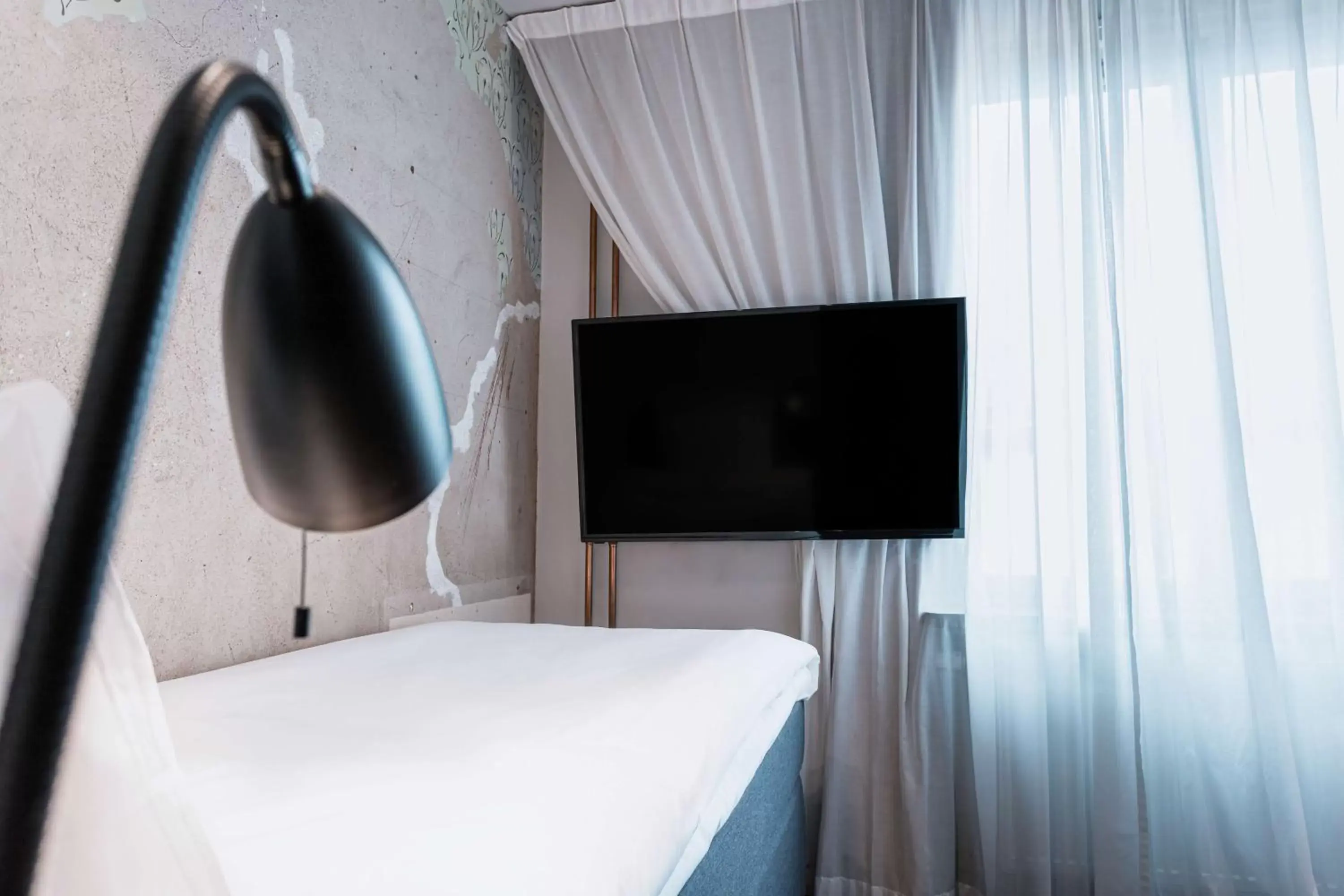 Bedroom, TV/Entertainment Center in Story Hotel Riddargatan, part of JdV by Hyatt