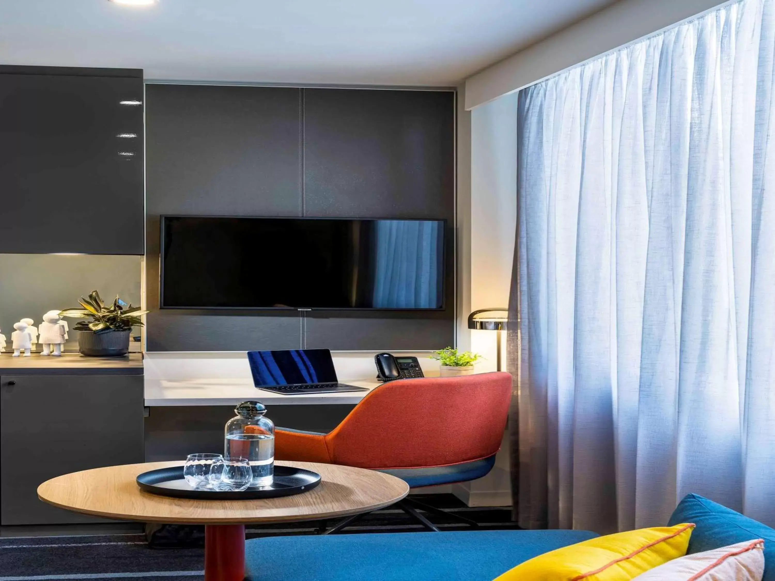 Photo of the whole room, TV/Entertainment Center in Novotel Melbourne Preston