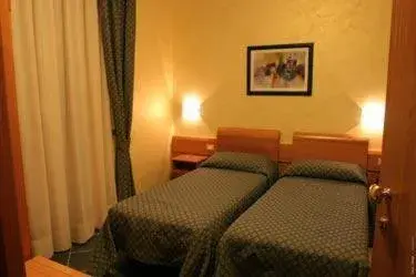 Photo of the whole room, Bed in Hotel Blue Rose's