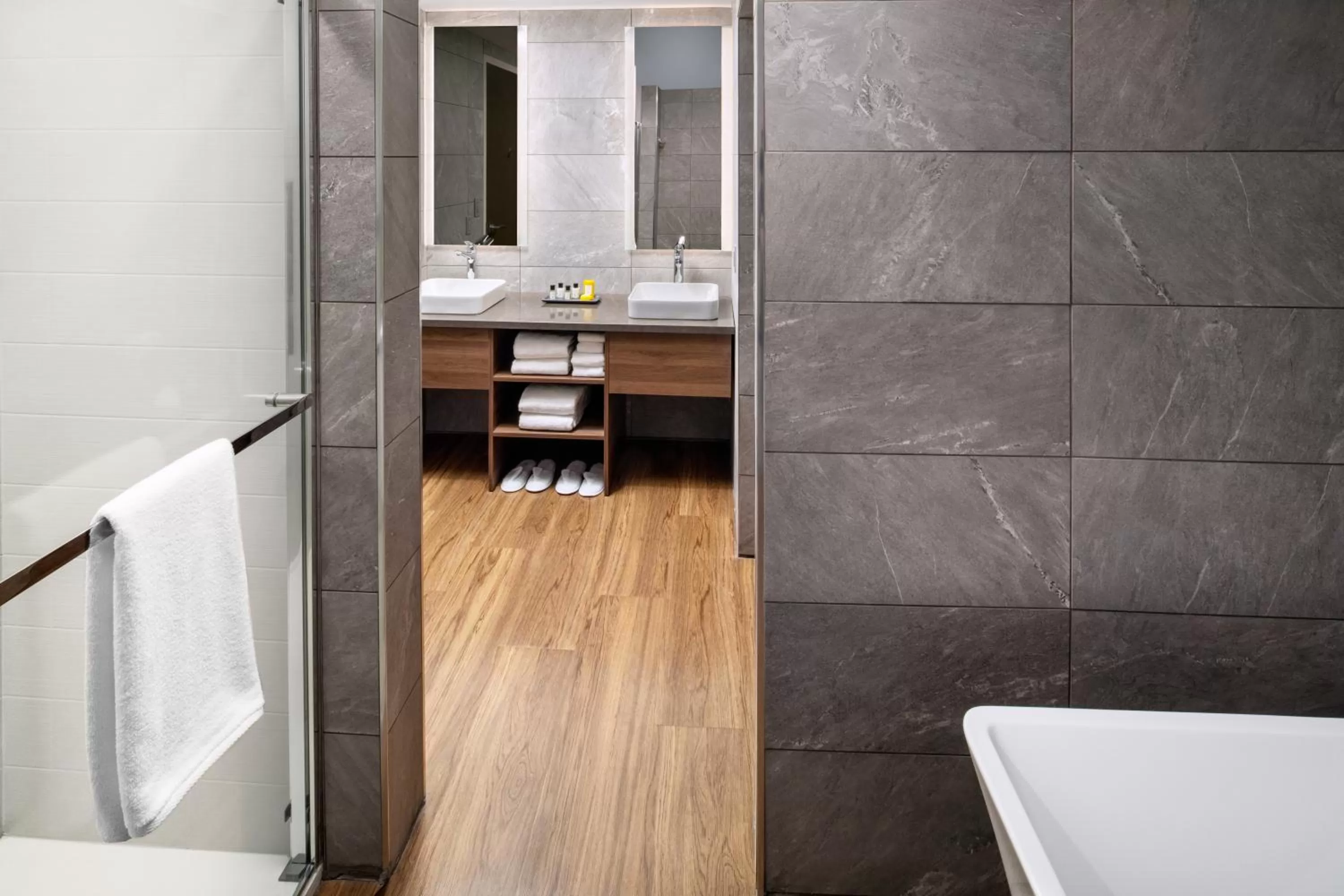 Bathroom in voco Saranac Lake NY - Waterfront by IHG