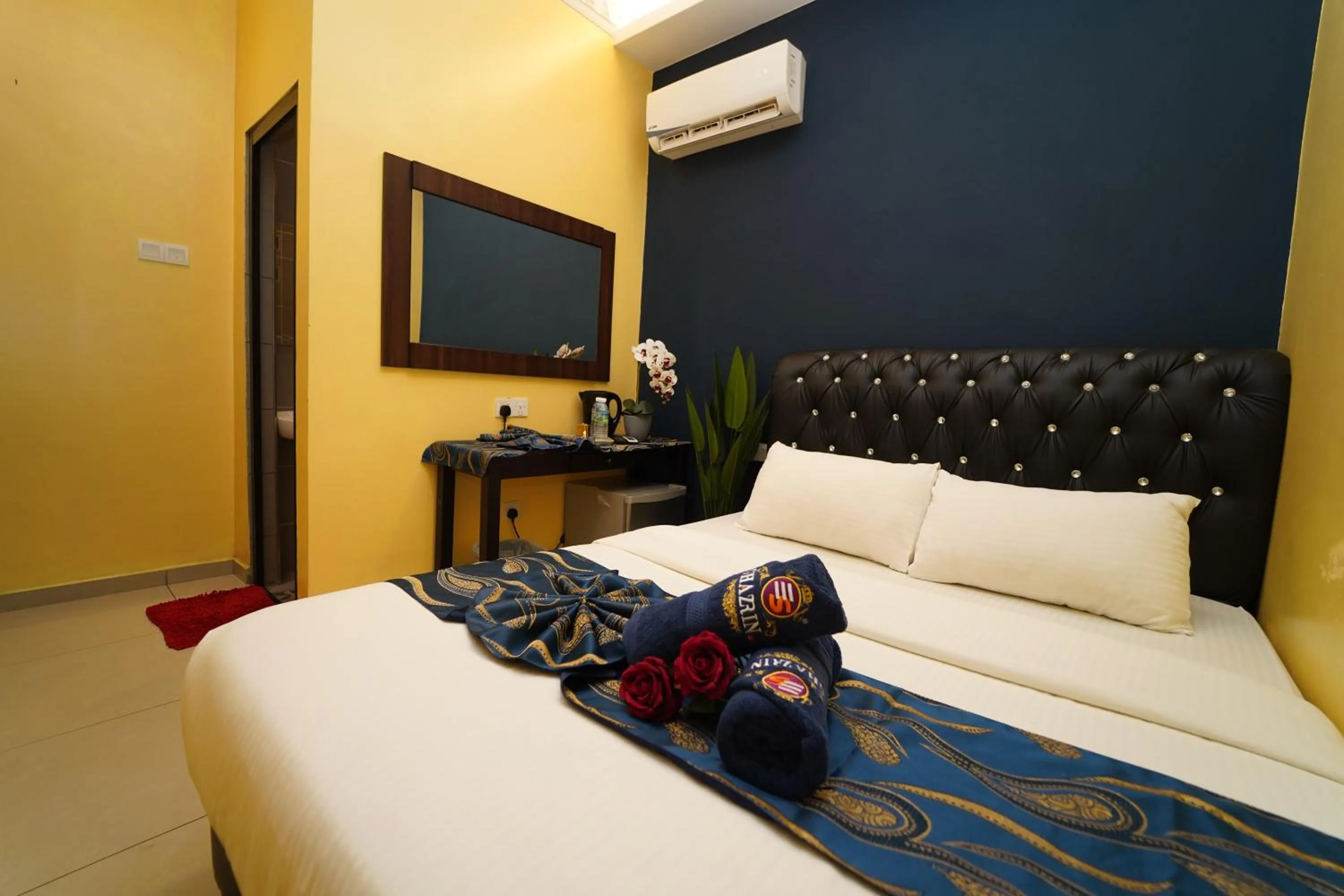 Bed in Ghazrin's Classic Hotel JB