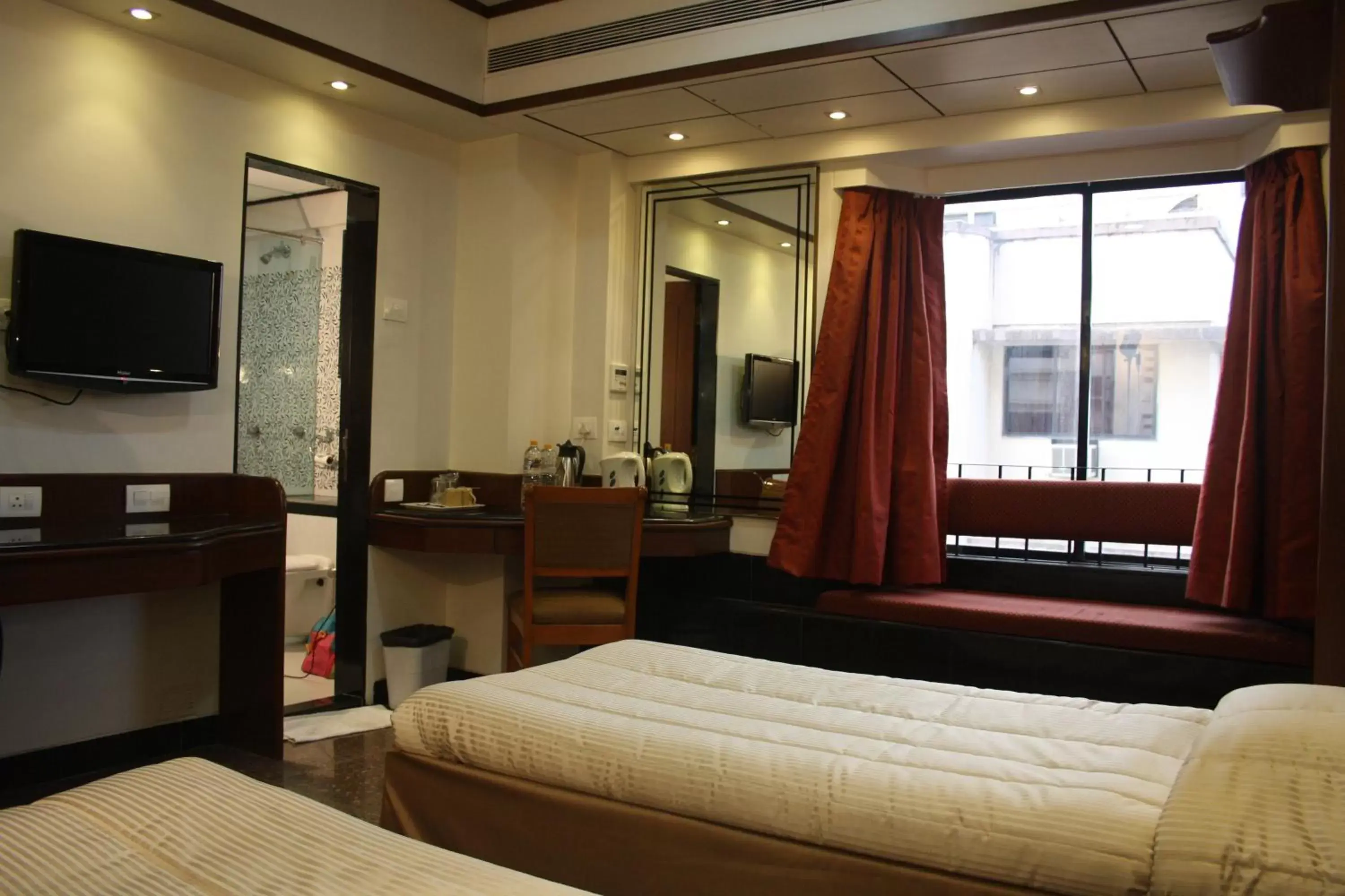 Photo of the whole room, Bed in Hotel Karl Residency