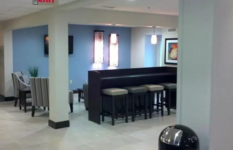 Lobby or reception, Lounge/Bar in Microtel Inn & Suites - Greenville