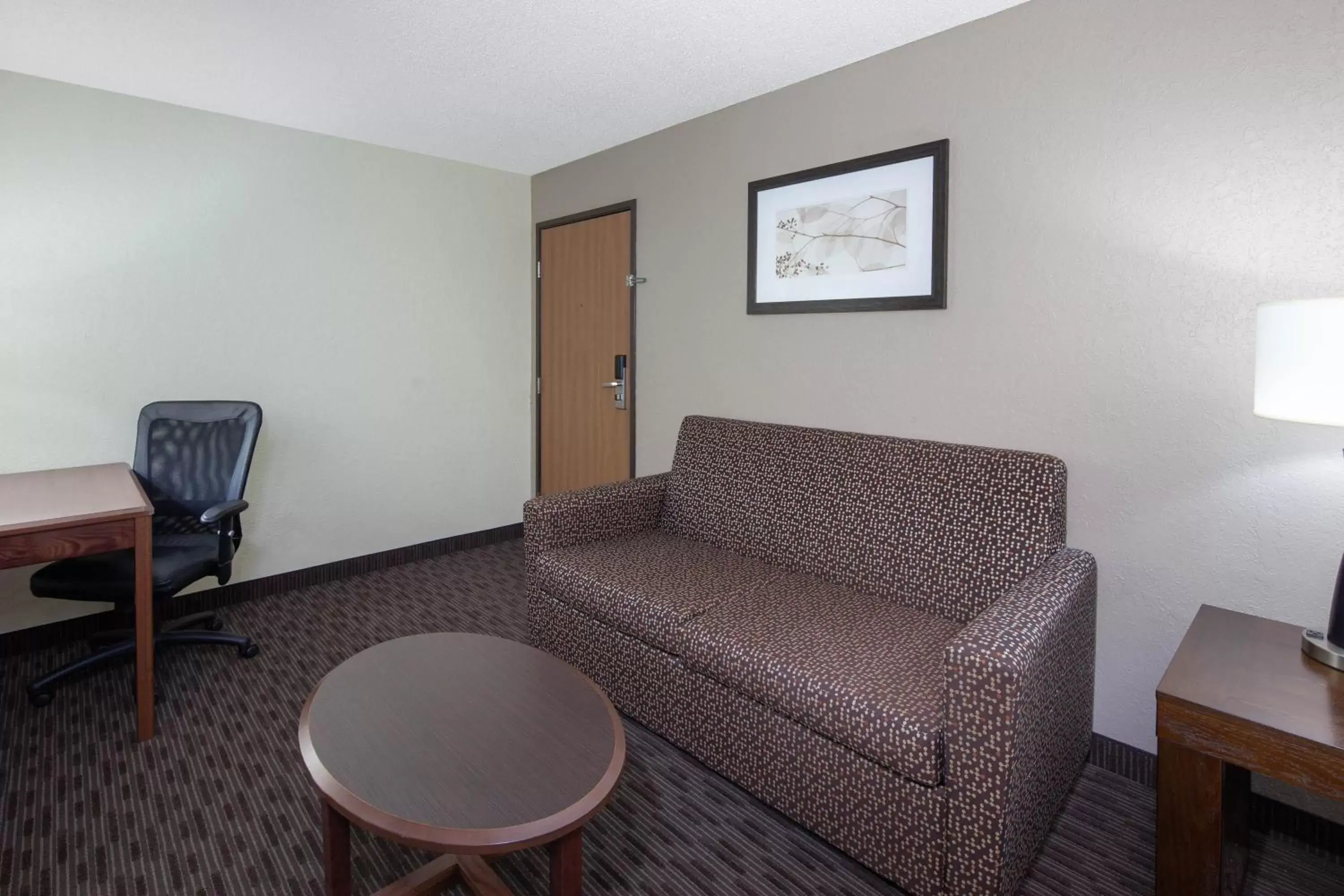 Living room, Seating Area in AmericInn by Wyndham Ironwood
