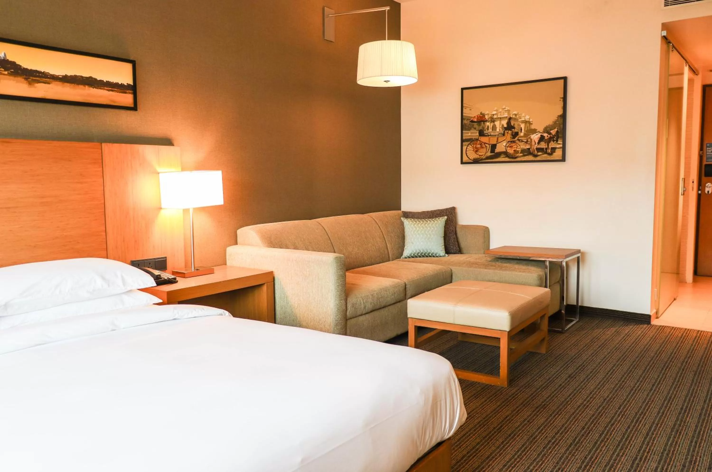 Living room, Bed in Hyatt Place Hyderabad Banjara Hills