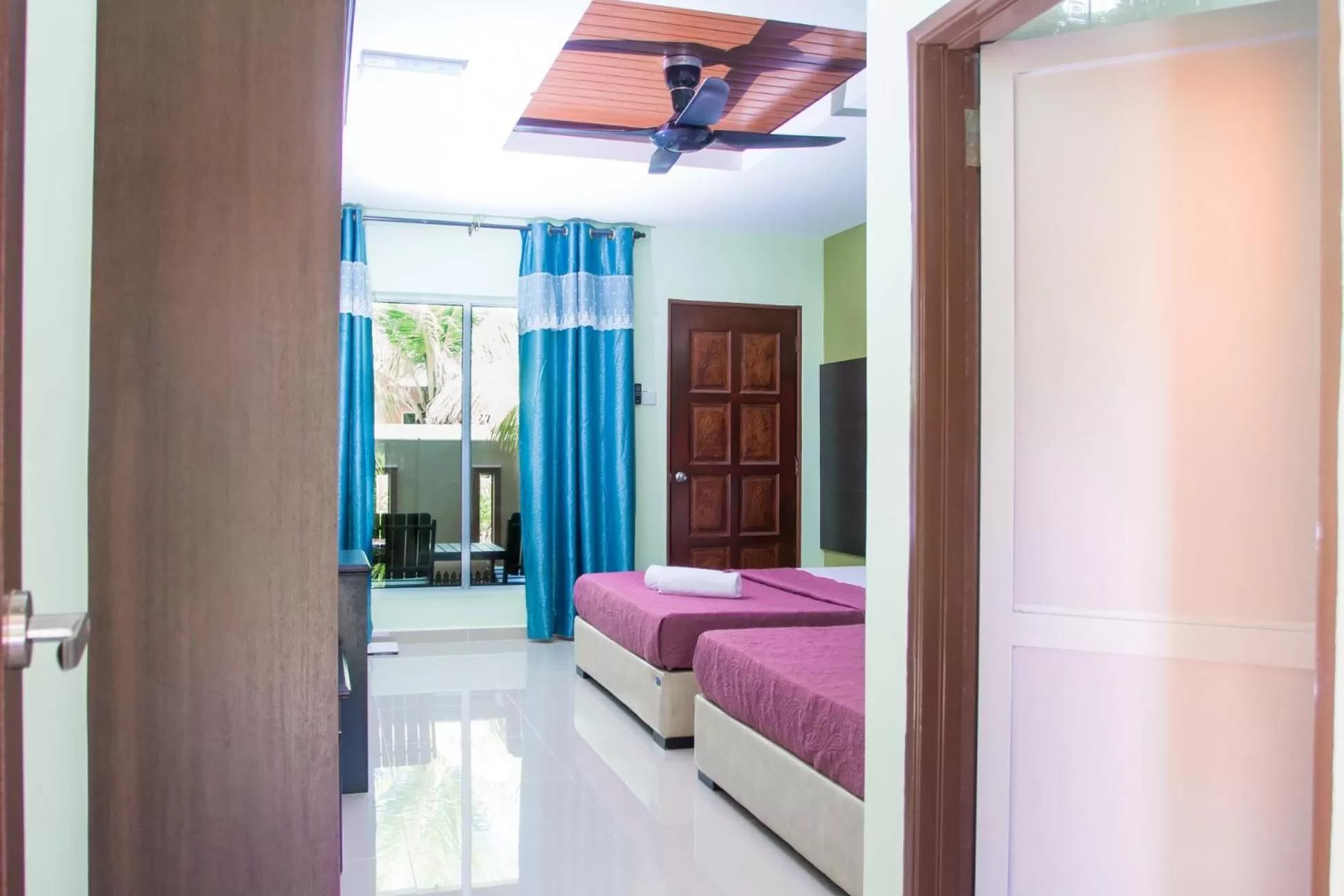 Bed in Chuu Pun Village Resort