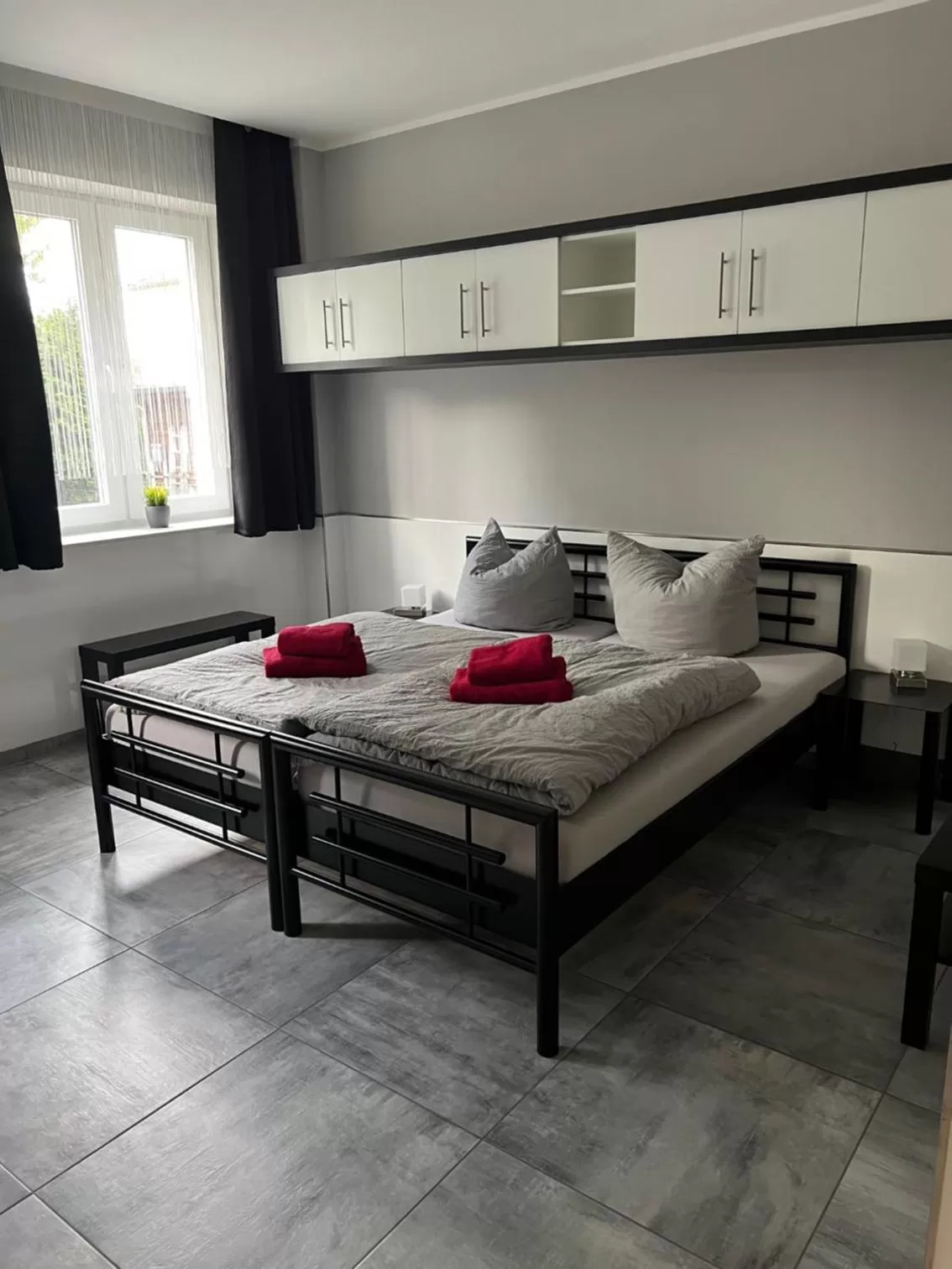 Photo of the whole room, Bed in Garni Hotel Eastside