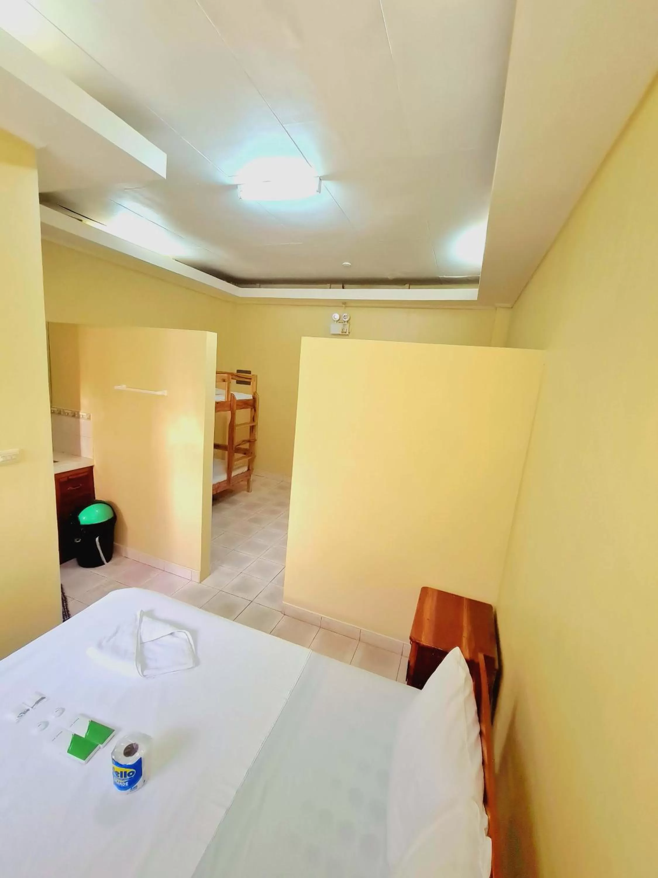 Bed in La-Familia Guest House