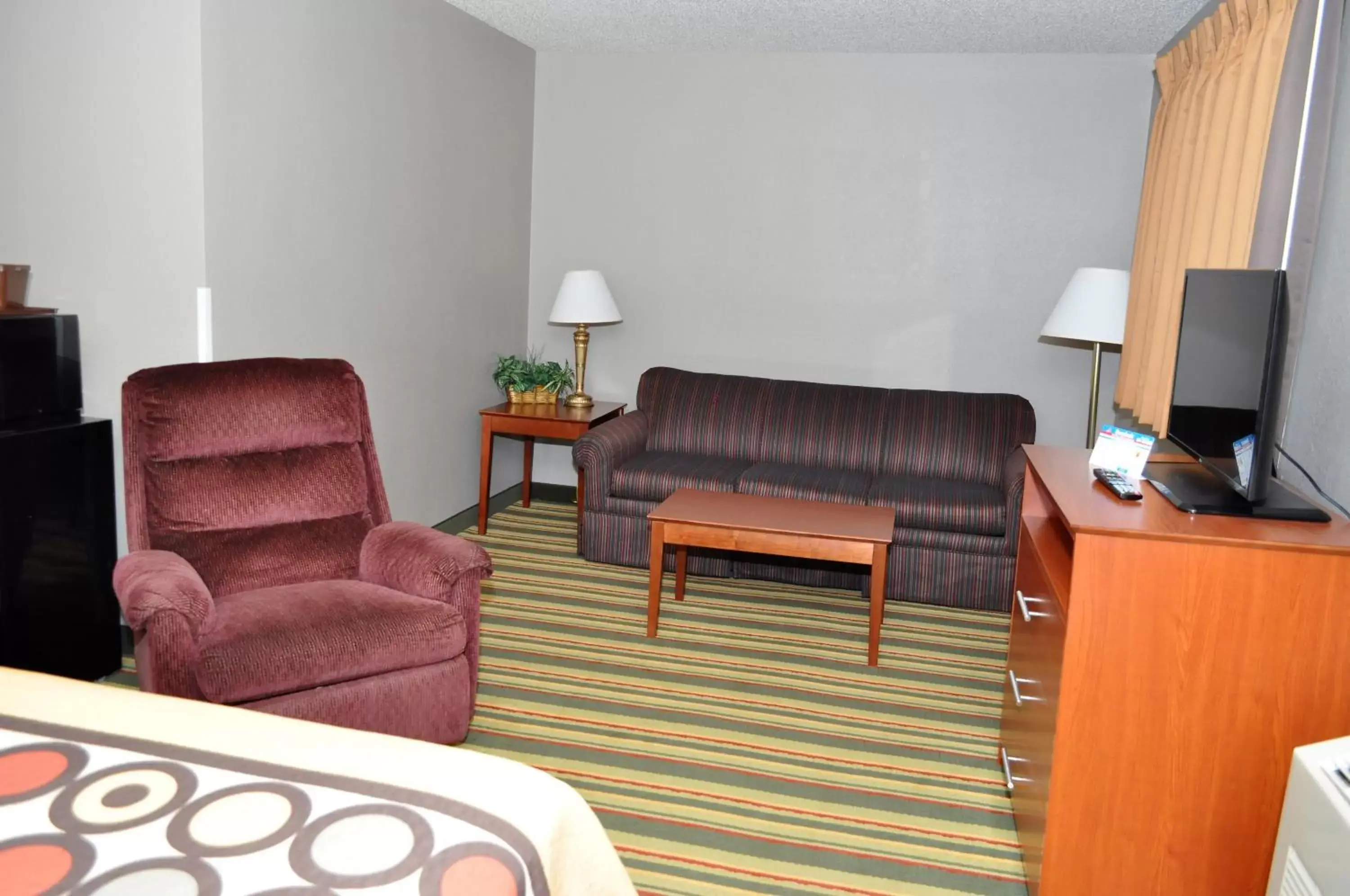 Seating Area in Super 8 by Wyndham Clearfield