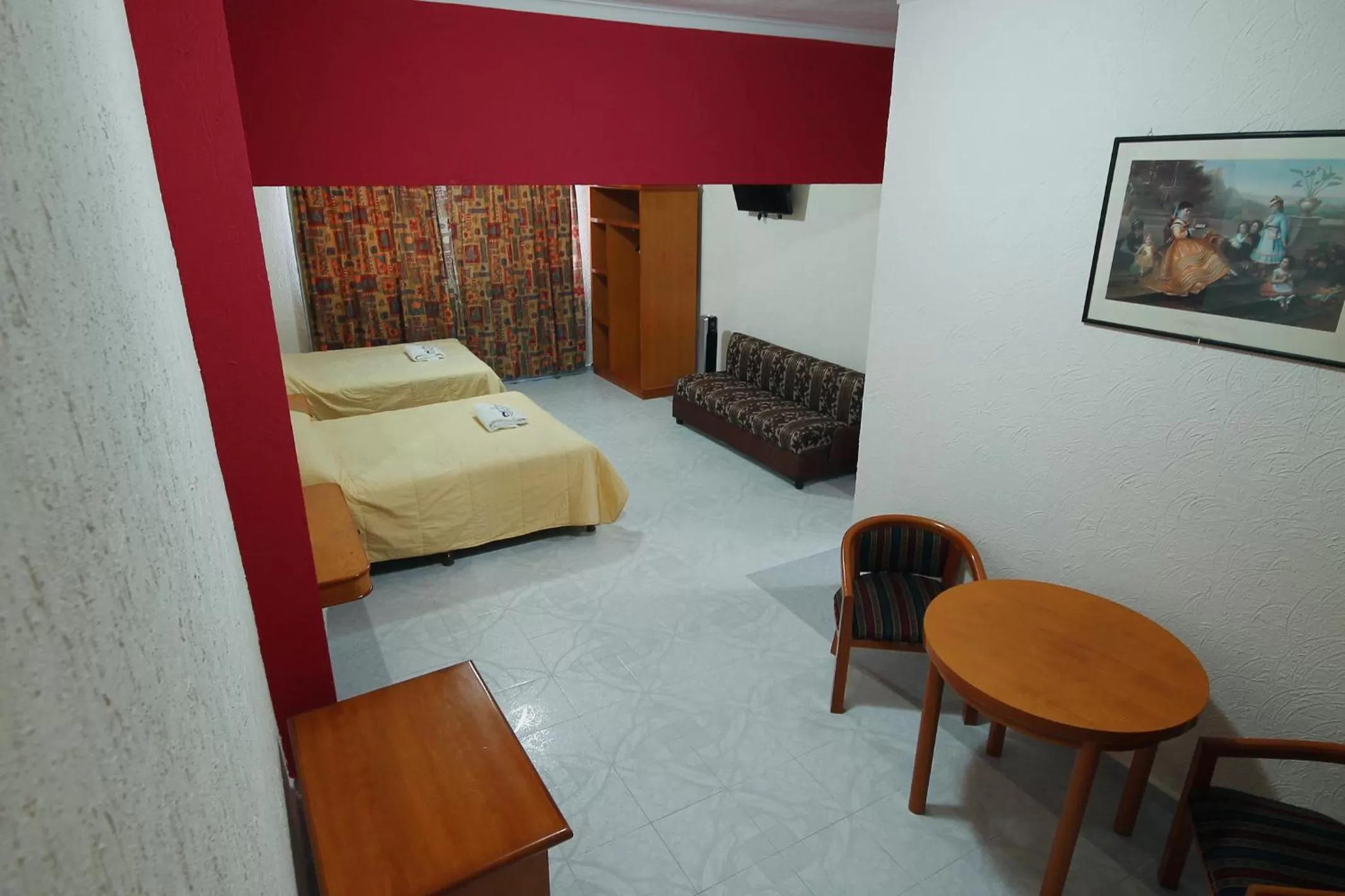 Bed in HOTEL EL CONQUISTADOR MONARCA.