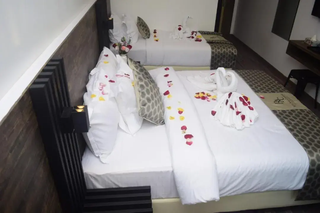 Bed in Rest And Comfort Boutique Hotel