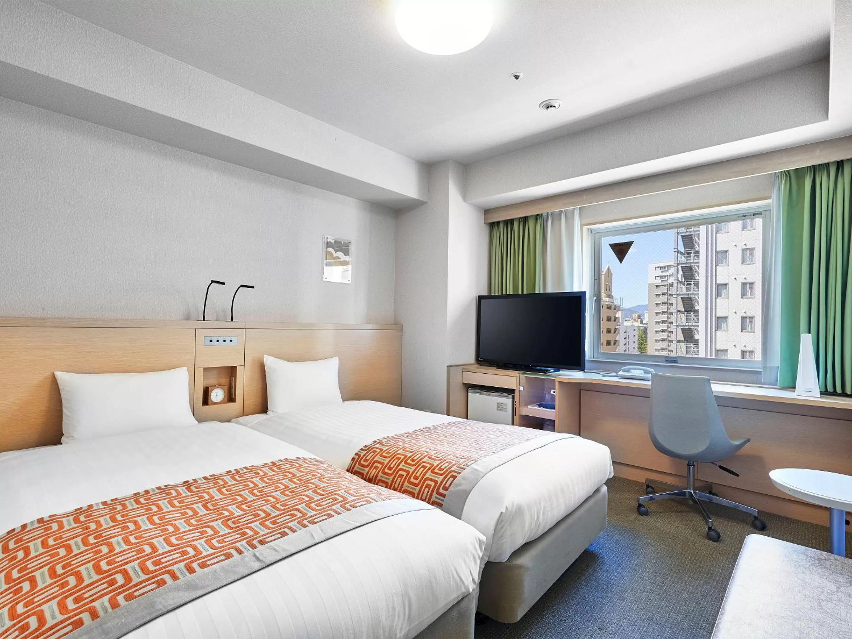 Photo of the whole room, Bed in Daiwa Roynet Hotel Hiroshima