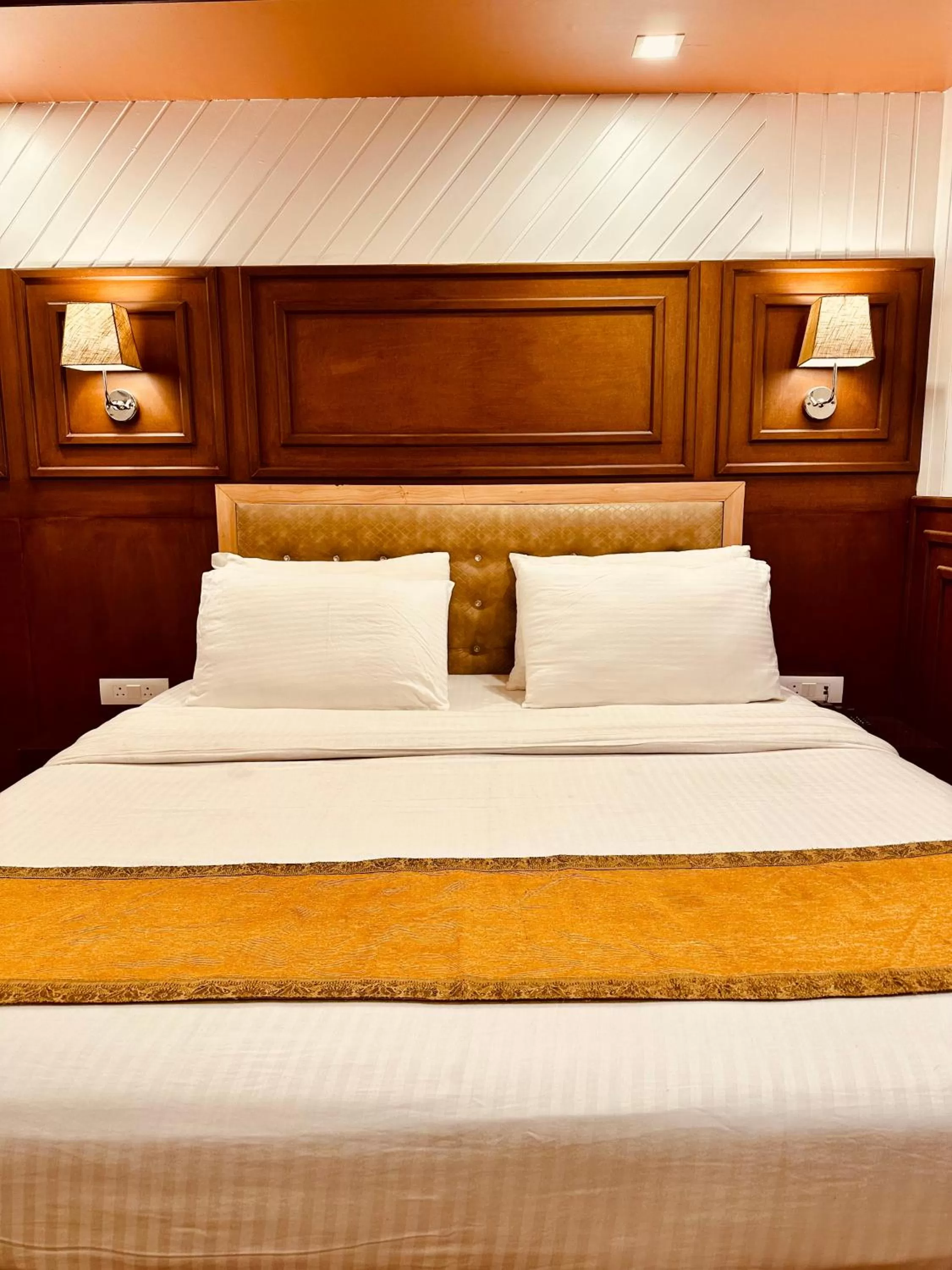 Bed in Walisons Hotel