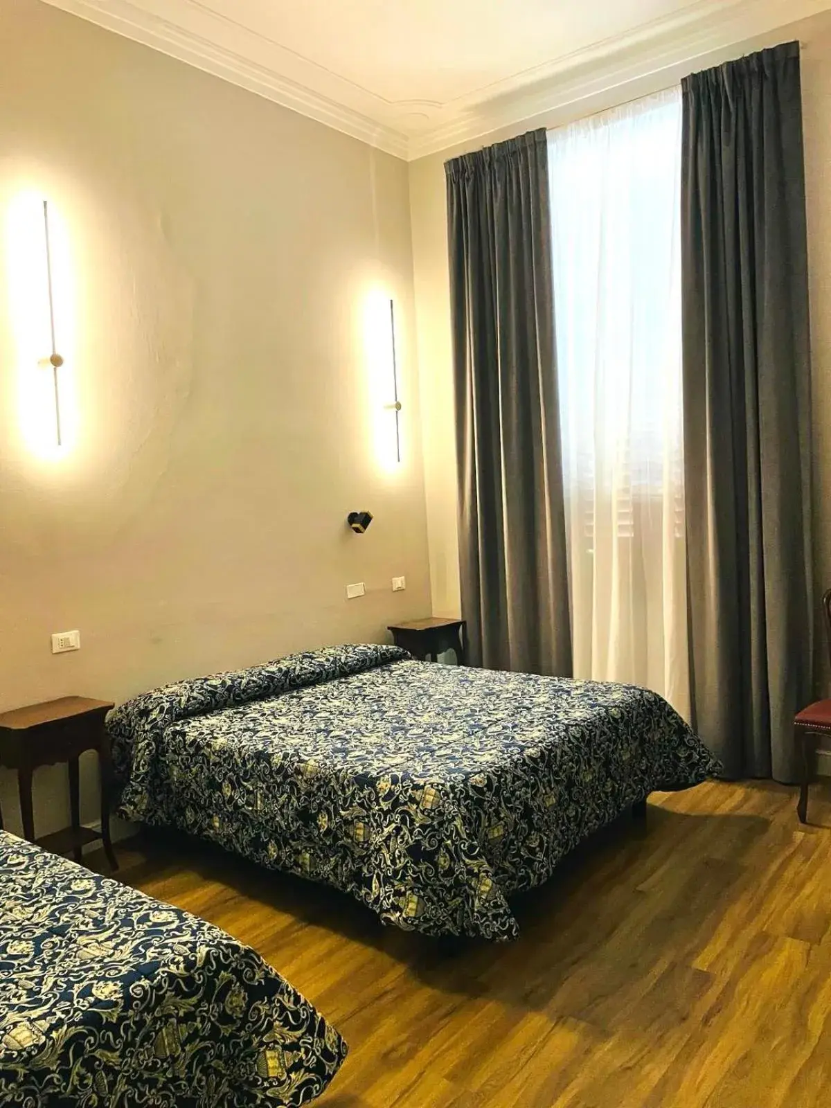 Bed in Hotel Lombardi