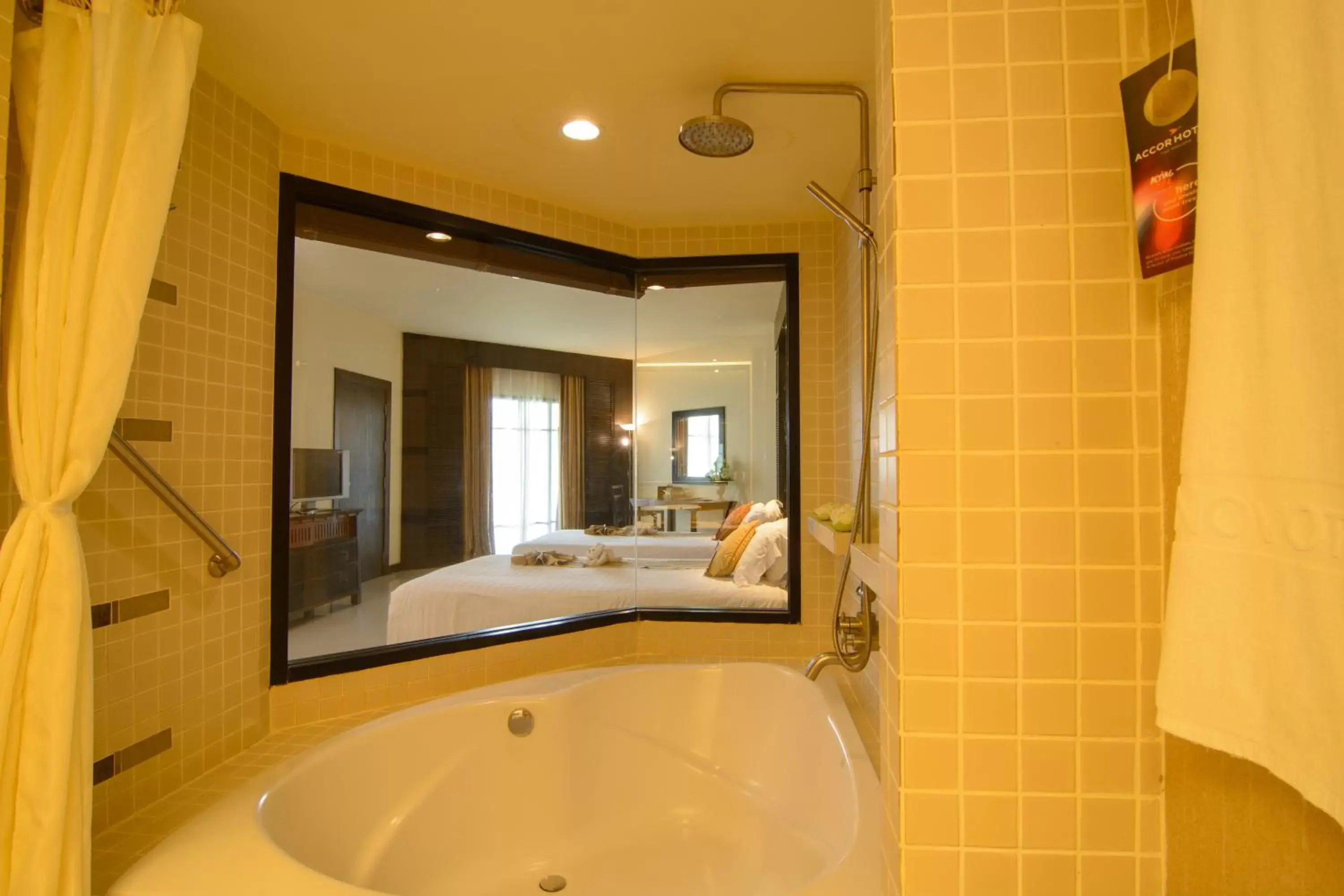 Bathroom, Bed in The Nouveau Chumphon Beach Resort And Golf Bathroom, Bed in The Nouveau Chumphon Beach Resort And Golf