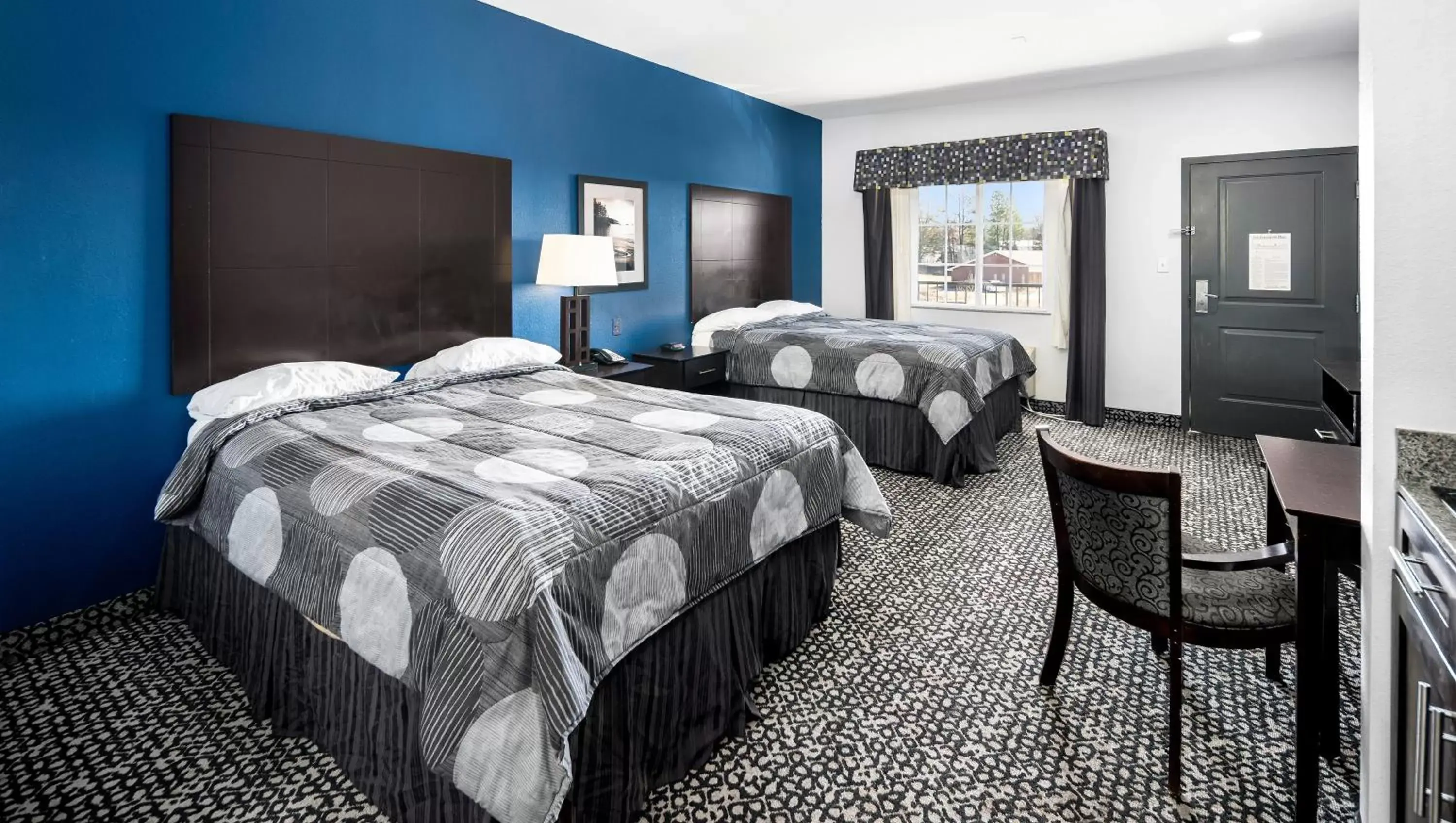 Bedroom in Belmont Inn and Suites Tatum