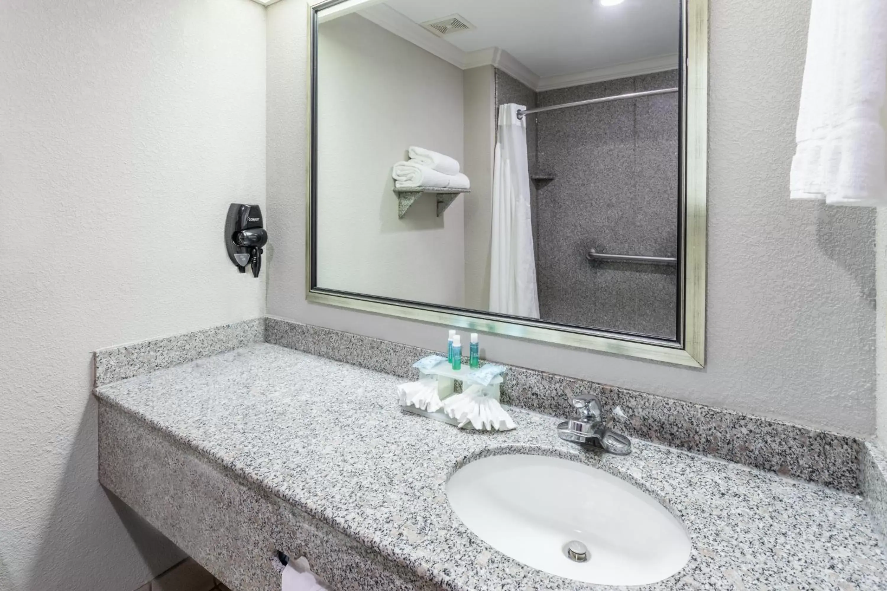 Bathroom in Holiday Inn Express Hotel and Suites Lake Charles, an IHG Hotel