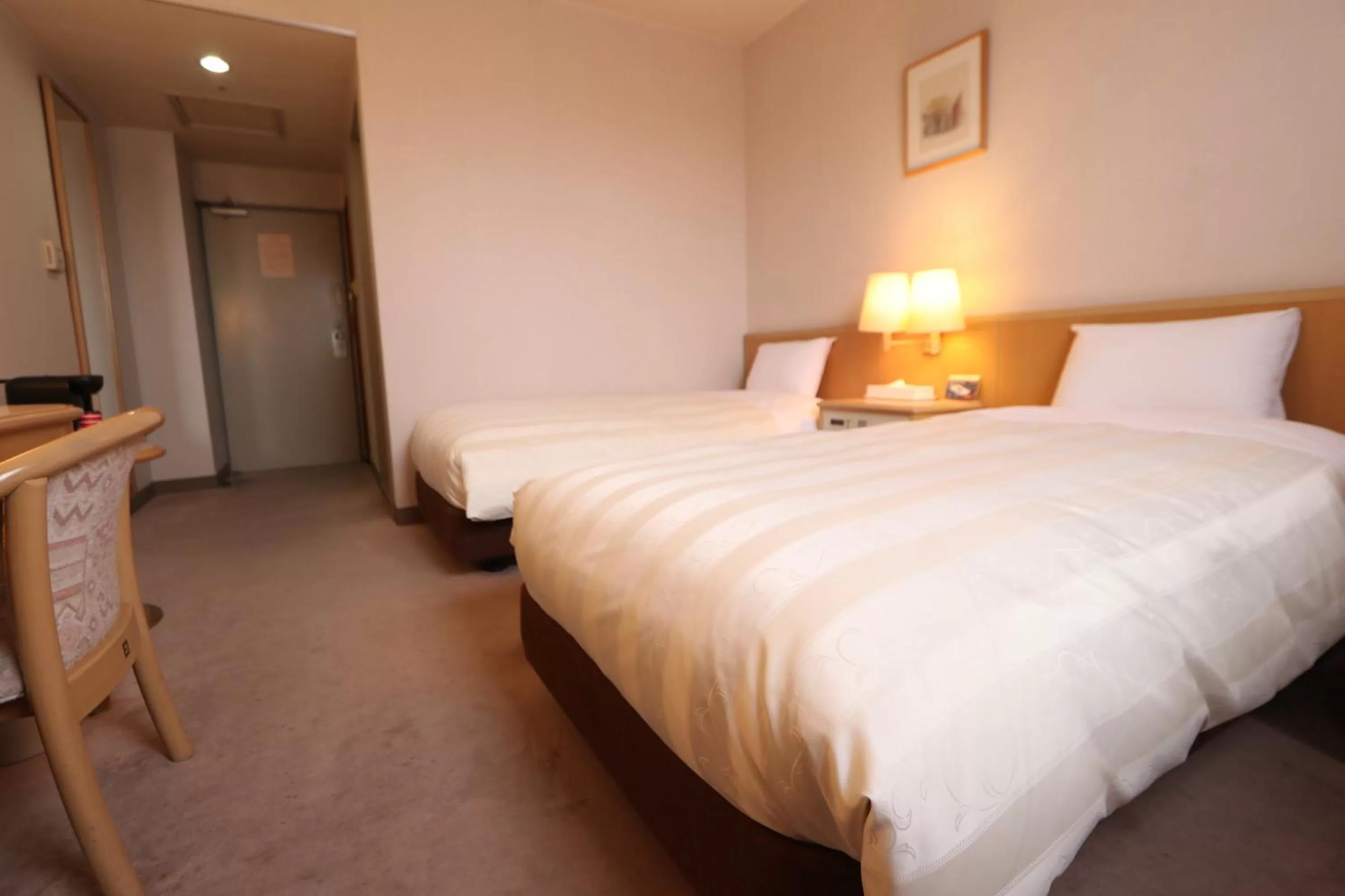 Bed in Oyama Palace Hotel