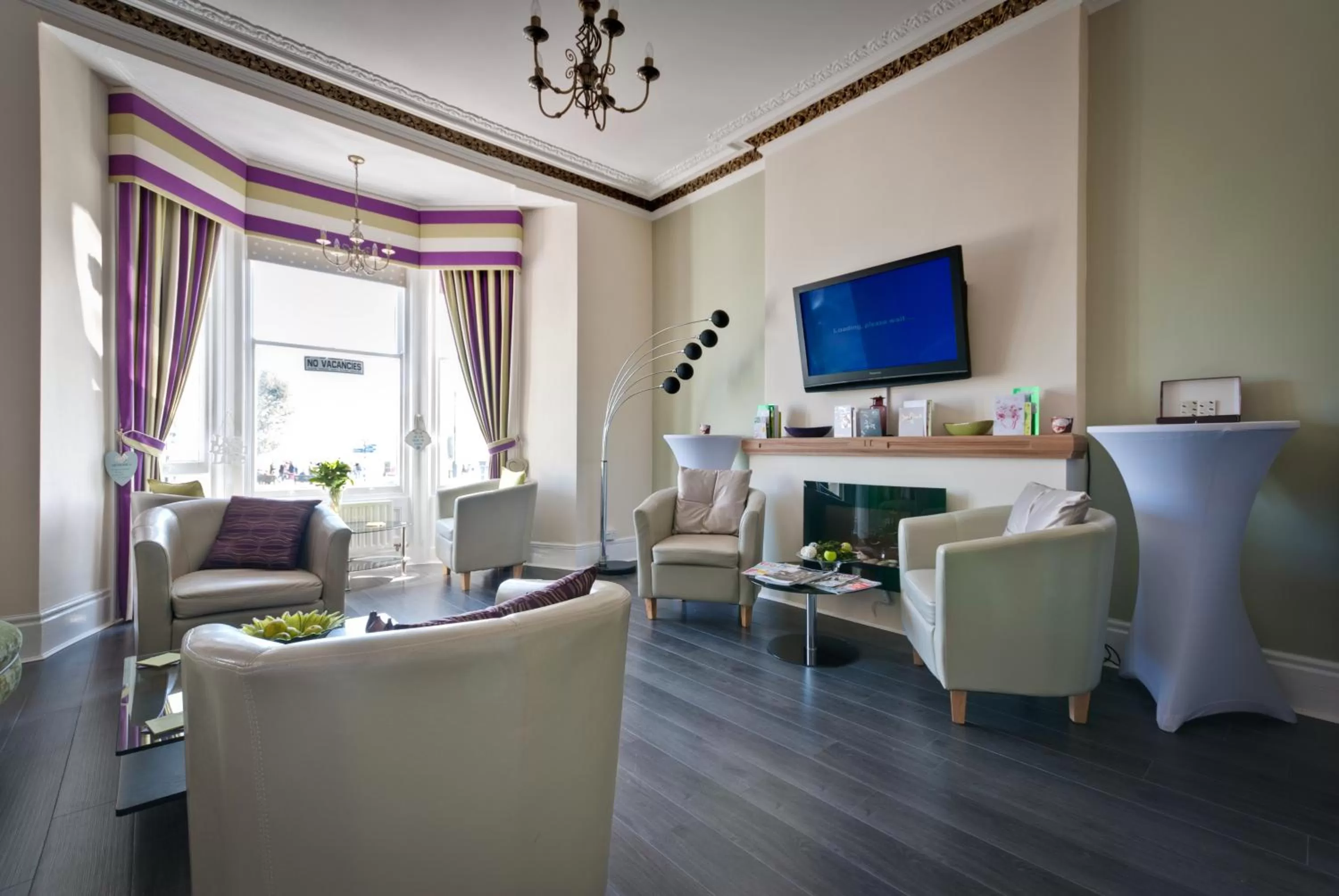 Communal lounge/ TV room in Lauriston & Lawton Court Hotel